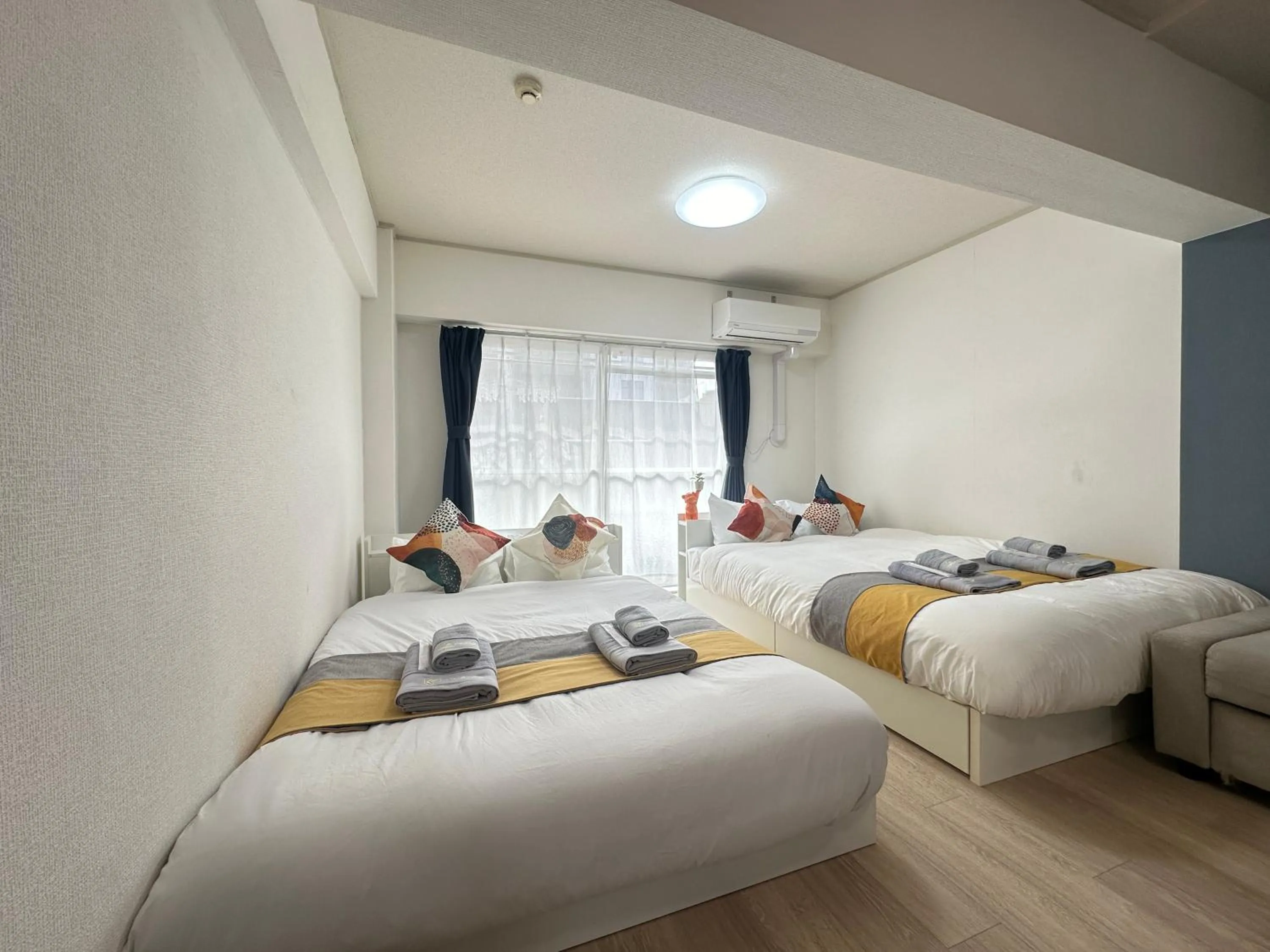 Bed in nestay apartment tokyo otsuka