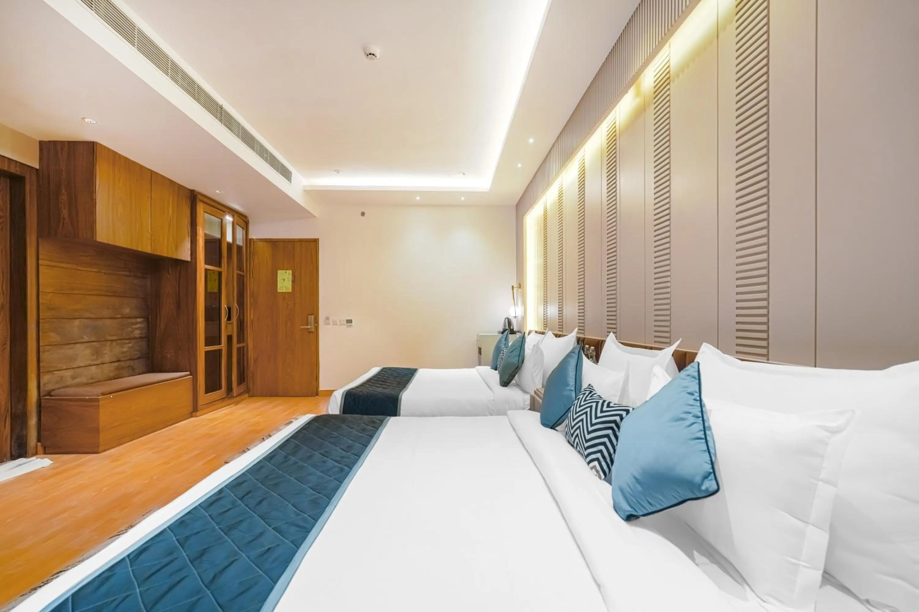 Bed in Quality Inn Elite Levelup Boutique