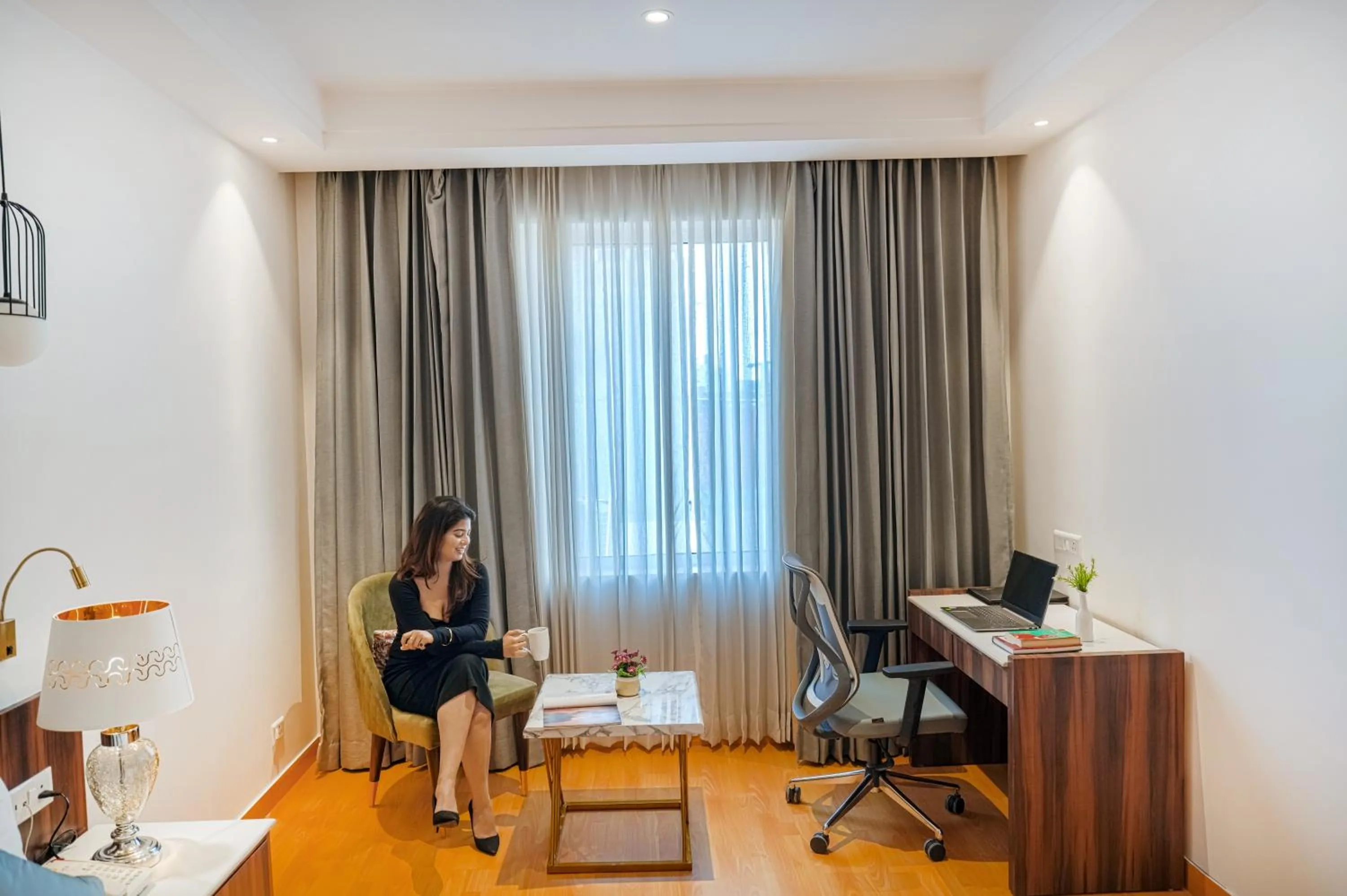 Seating area in Quality Inn Elite Levelup Boutique