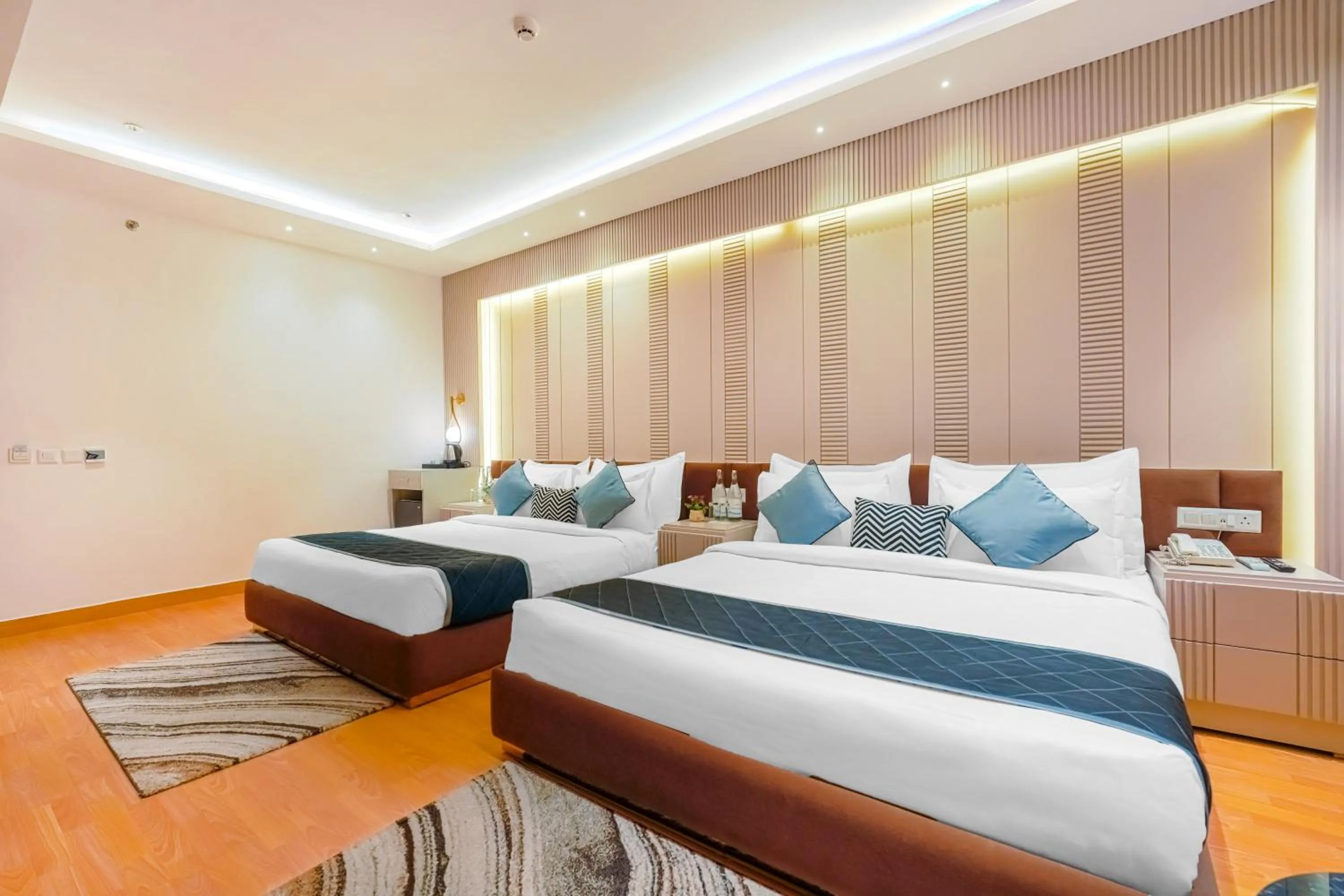 Bed in Quality Inn Elite Levelup Boutique