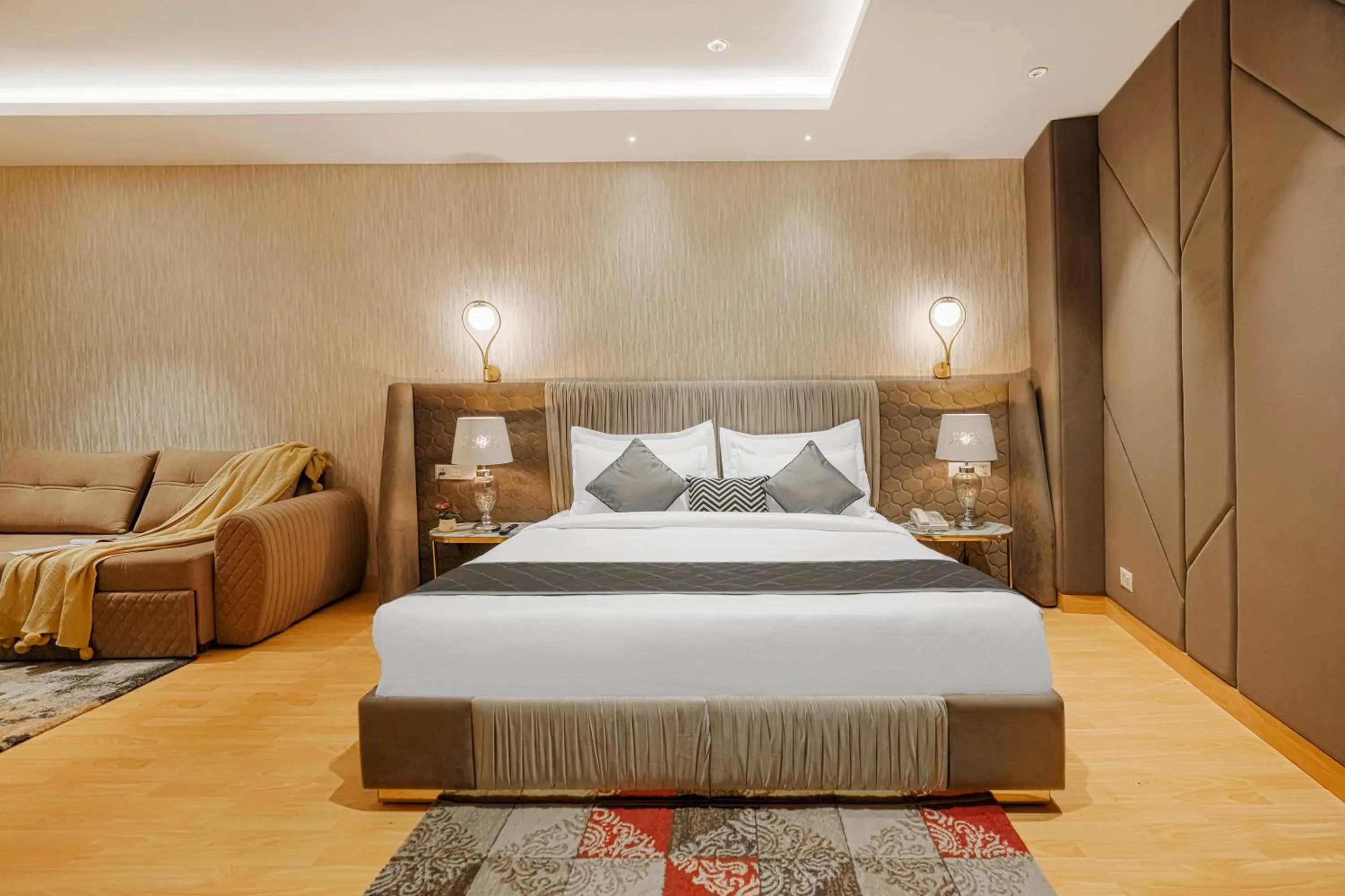 Bed in Quality Inn Elite Levelup Boutique