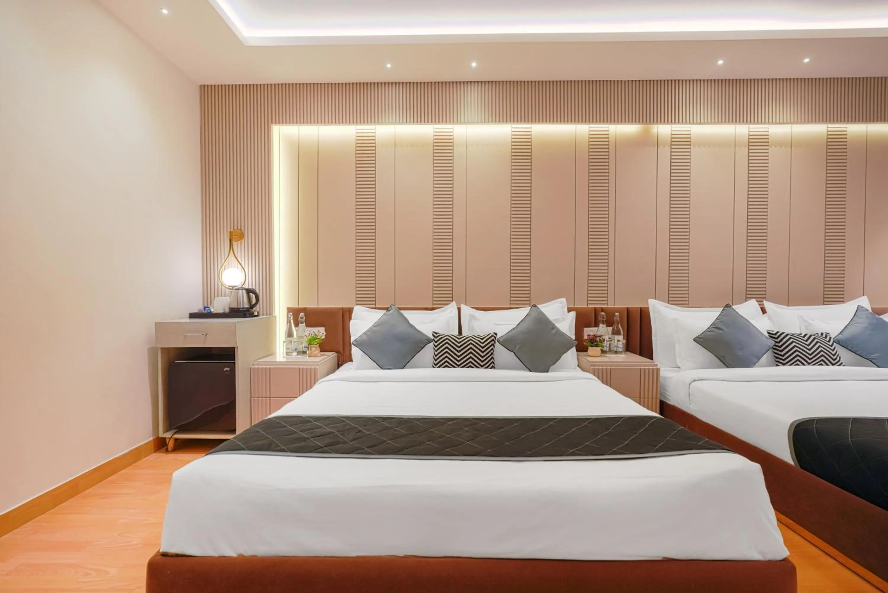 Bed in Quality Inn Elite Levelup Boutique