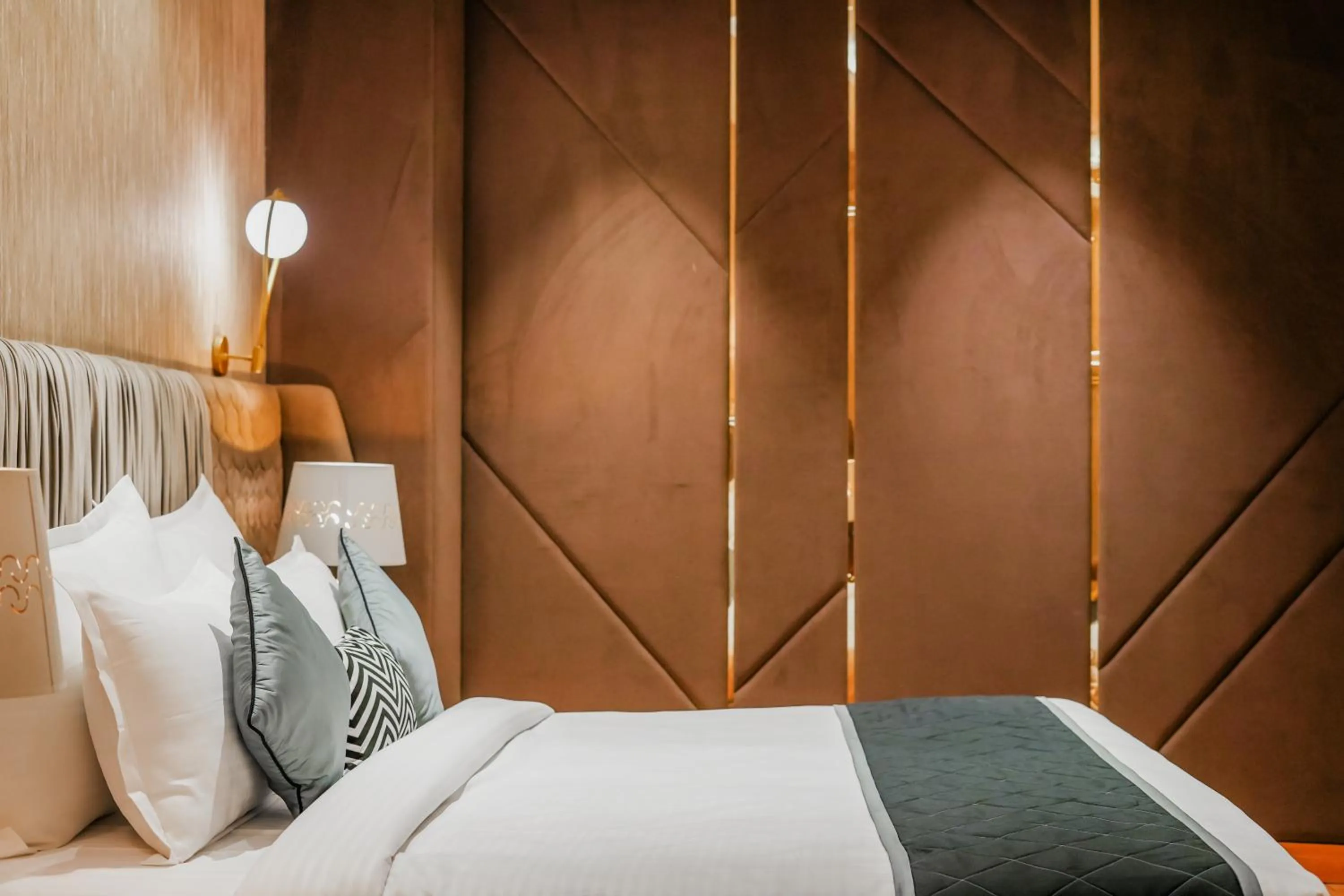 Bed in Quality Inn Elite Levelup Boutique