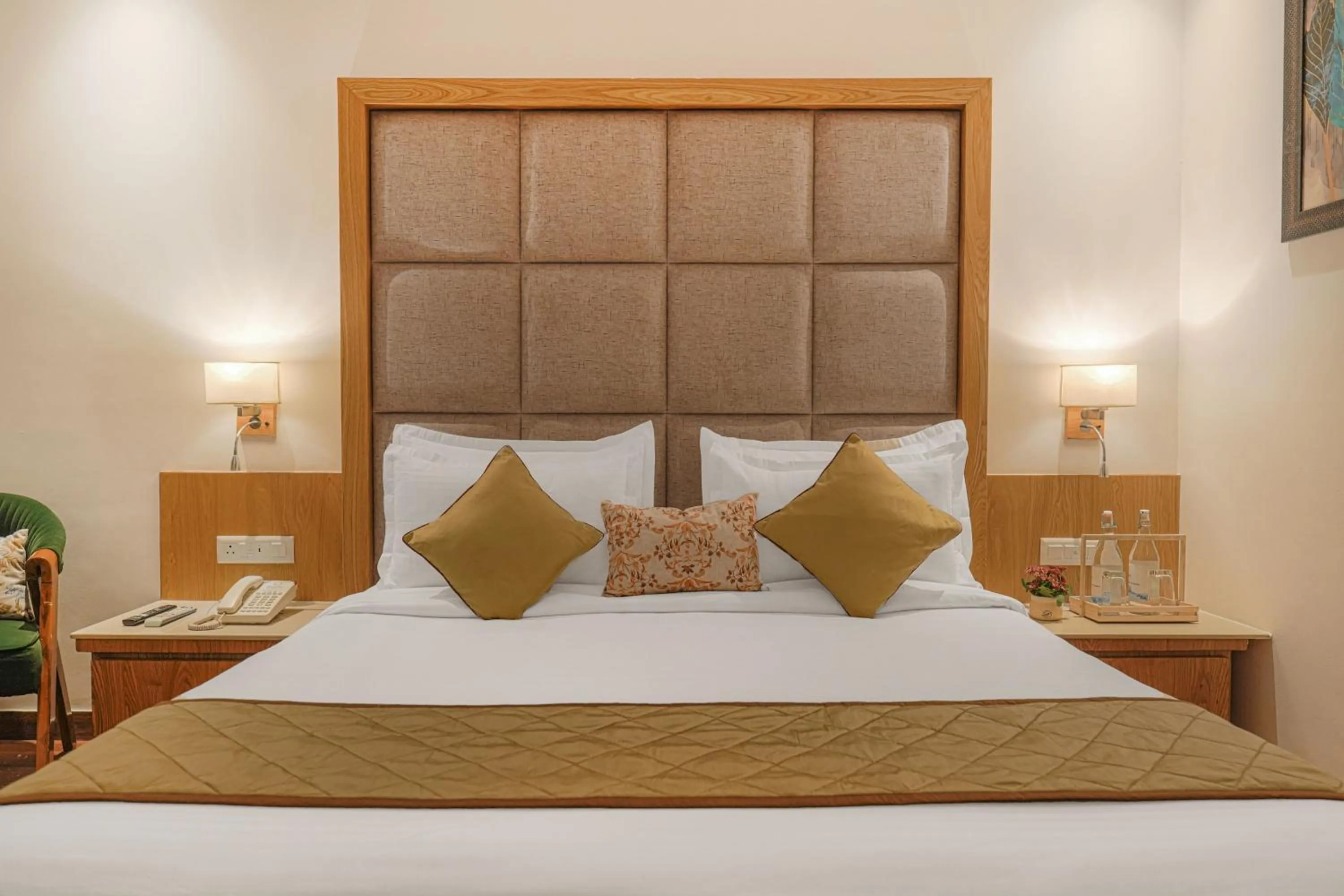 Bed in Quality Inn Elite Levelup Boutique