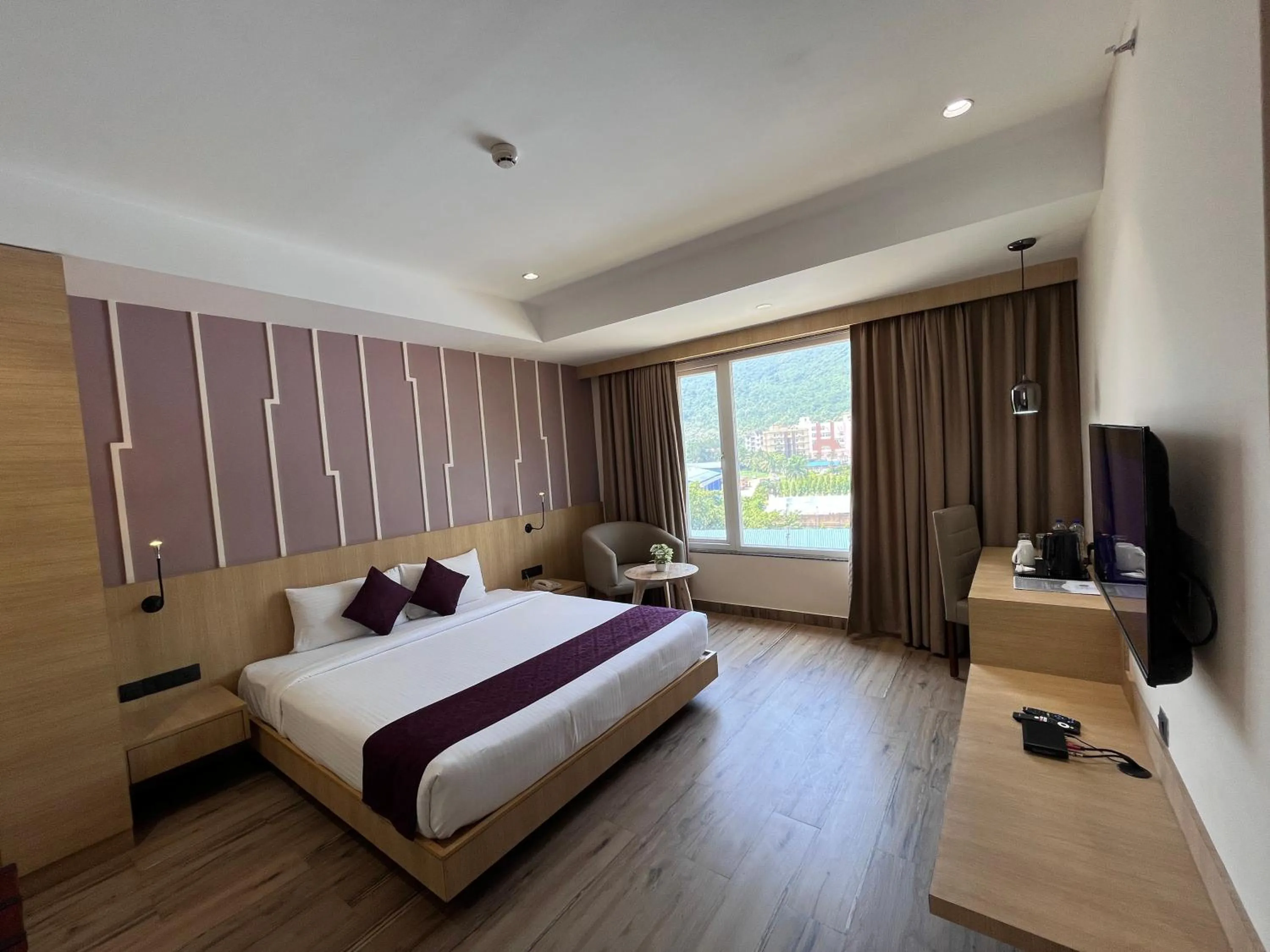 Photo of the whole room, Bed in Sachika Hotels, Guwahati