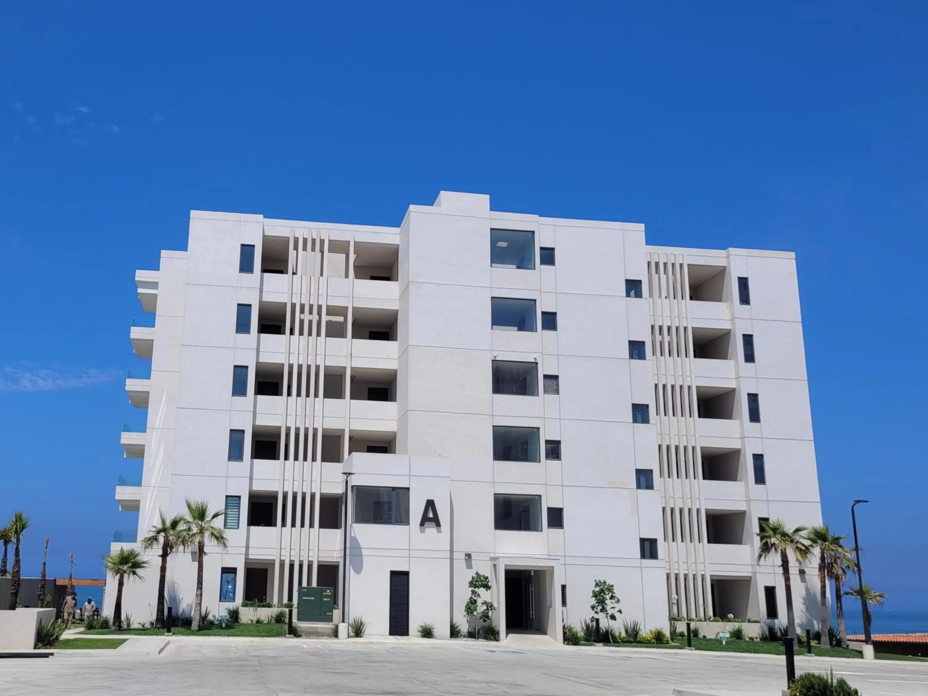 Property building in Seafront Condo Pool and Jacuzzi