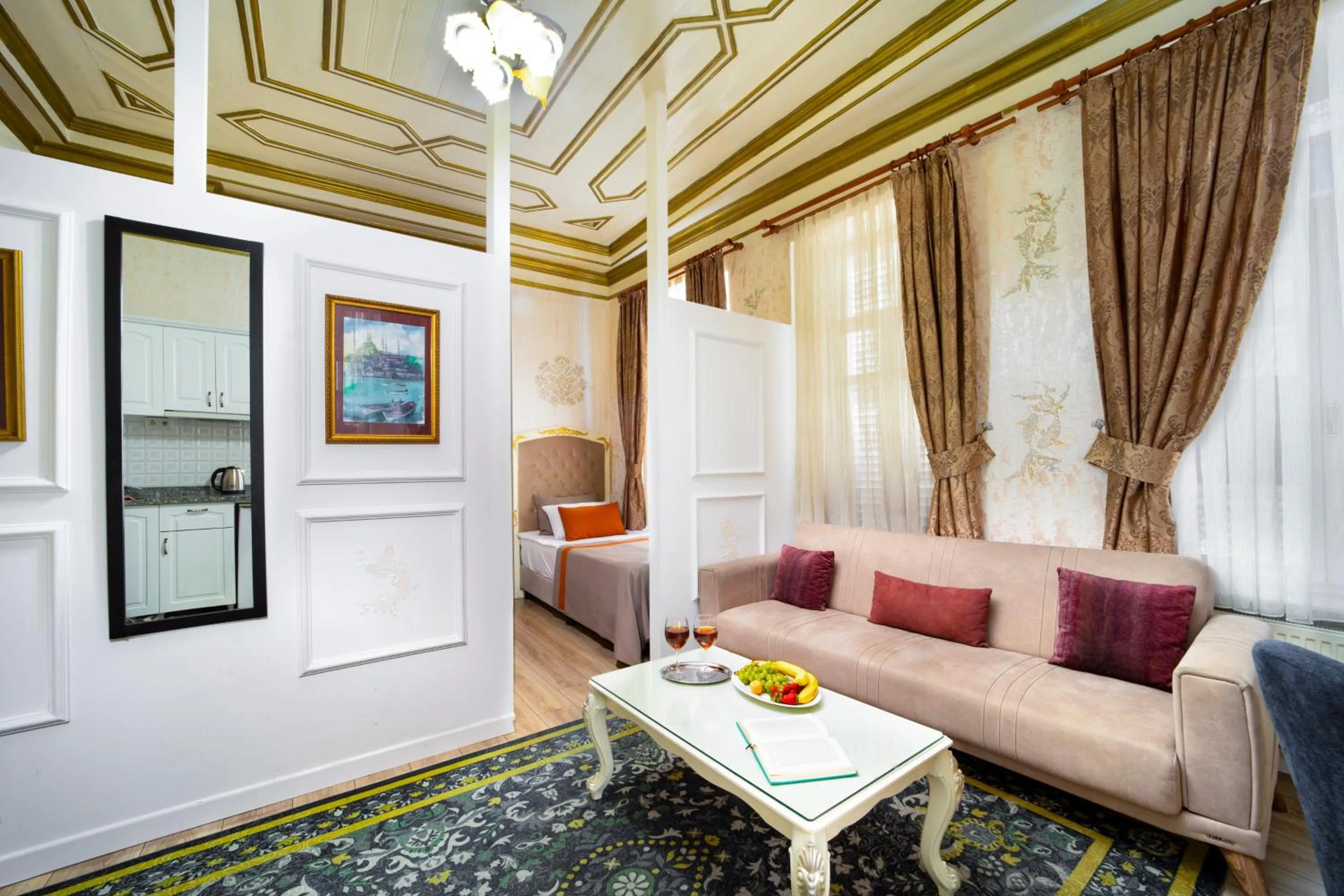 Seating area in Alhambra Apart Hotel