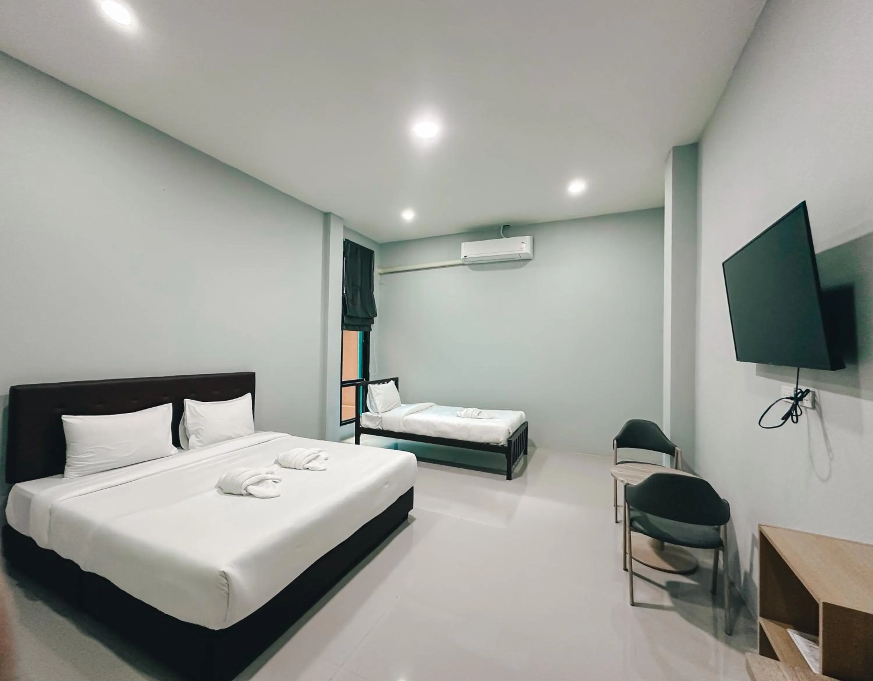 Bed in Tuscany Hotel Buriram