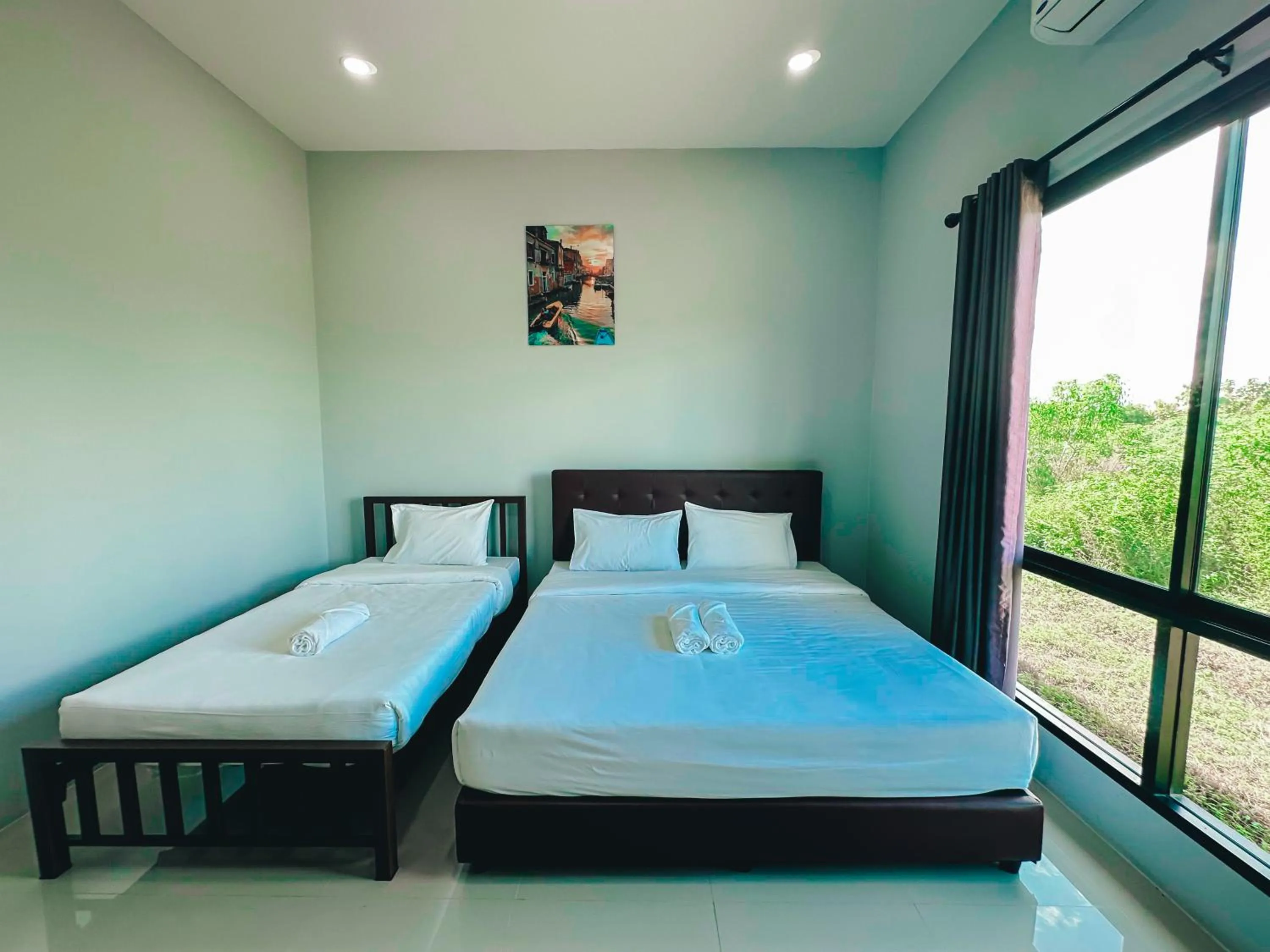 Bed in Tuscany Hotel Buriram