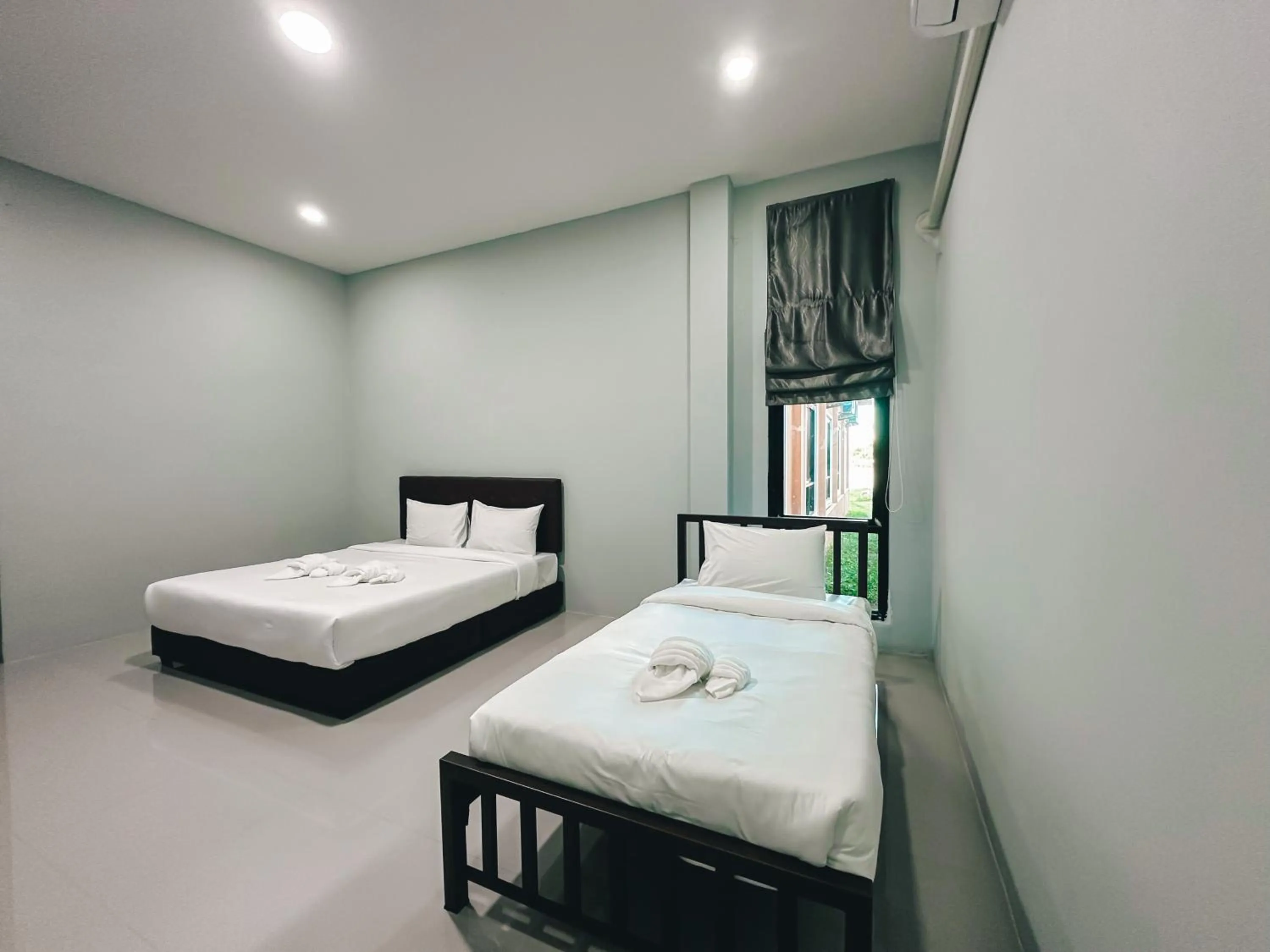 Bed in Tuscany Hotel Buriram