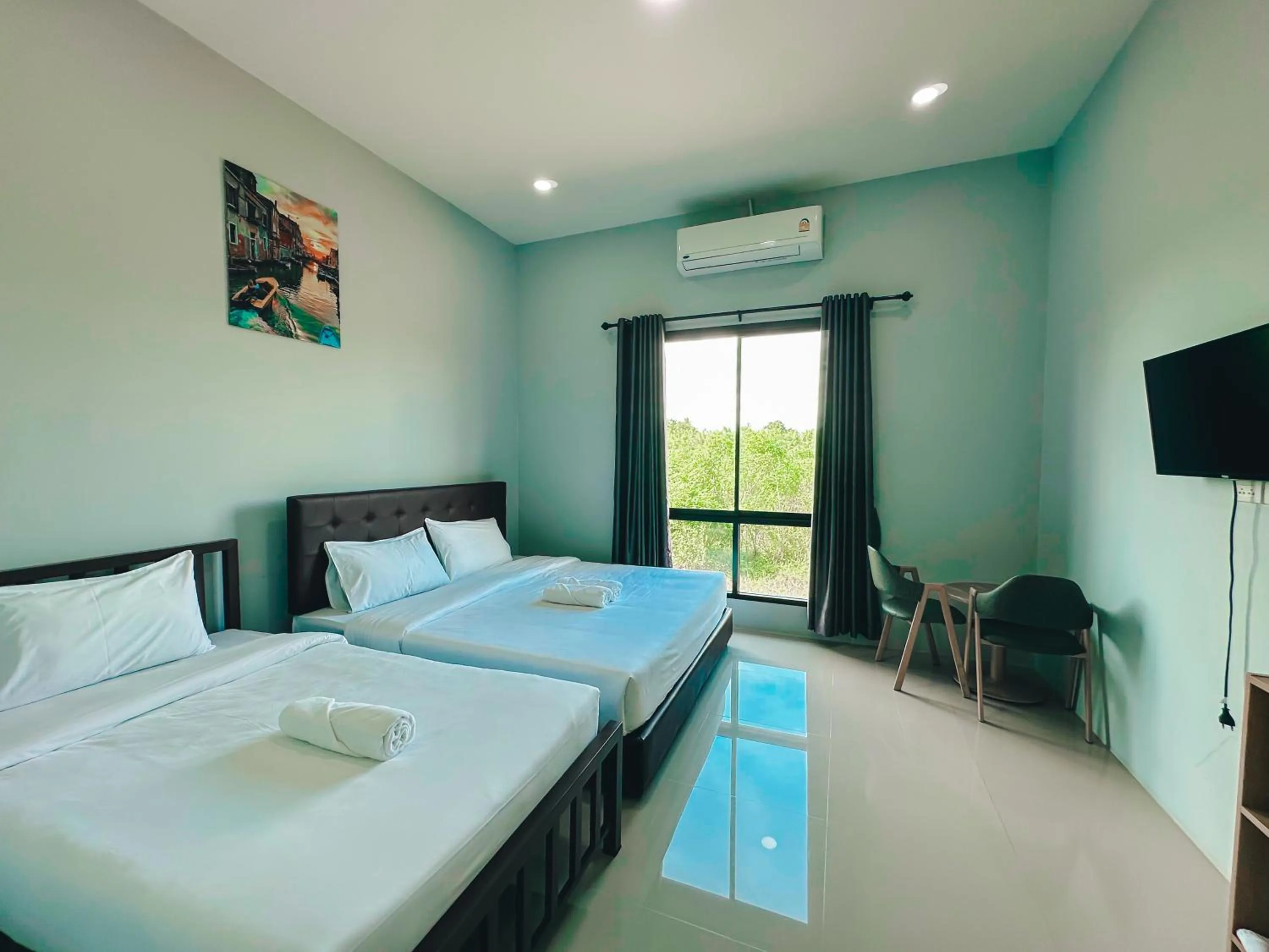 Bed in Tuscany Hotel Buriram