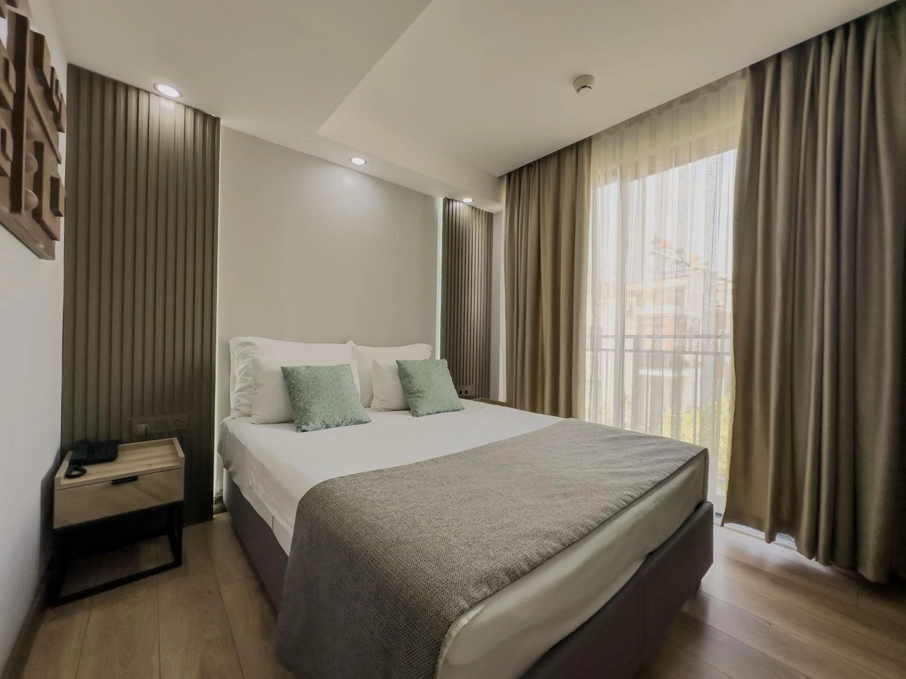 Bed in Leaf River Suites