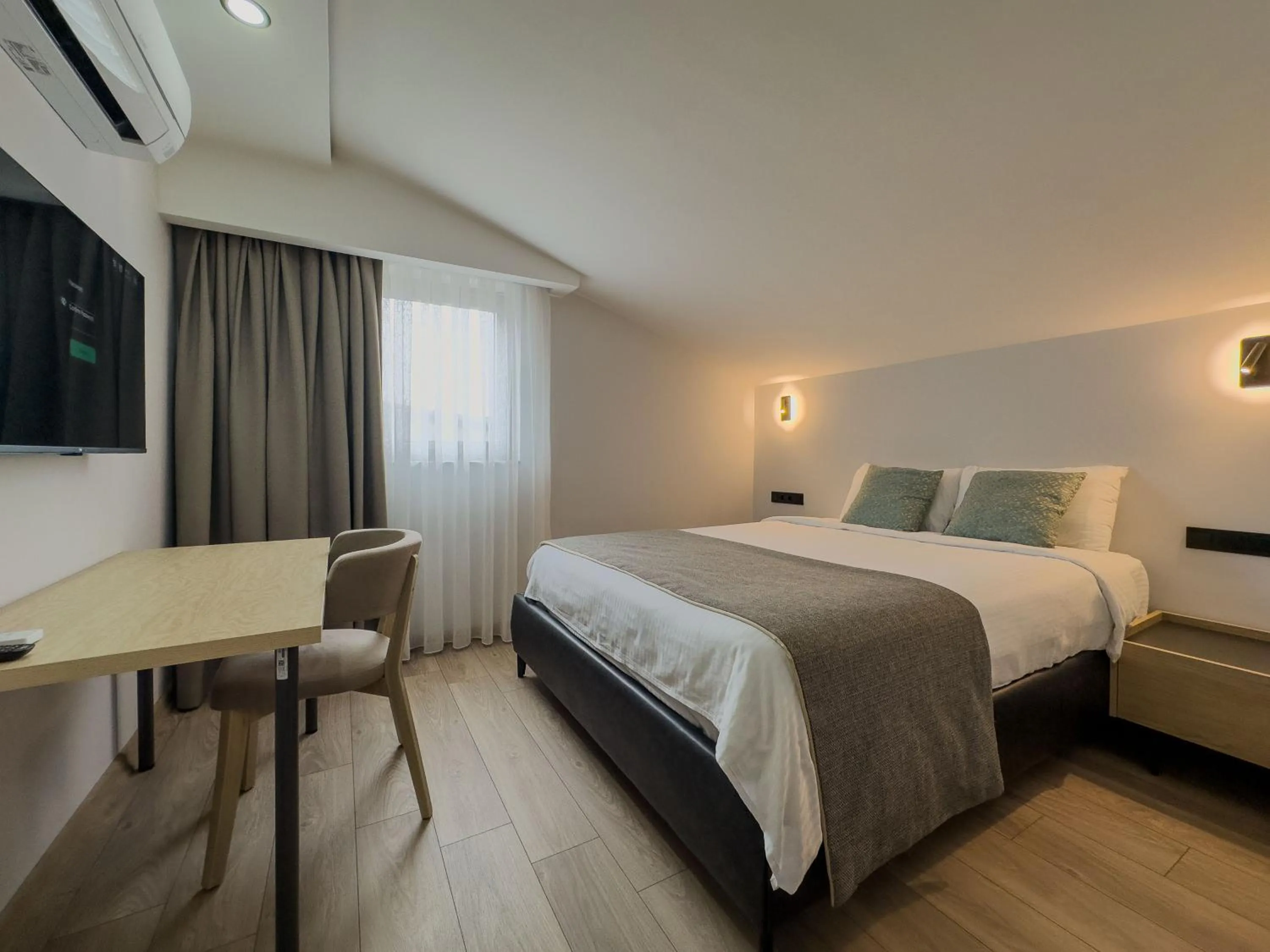 Bed in Leaf River Suites