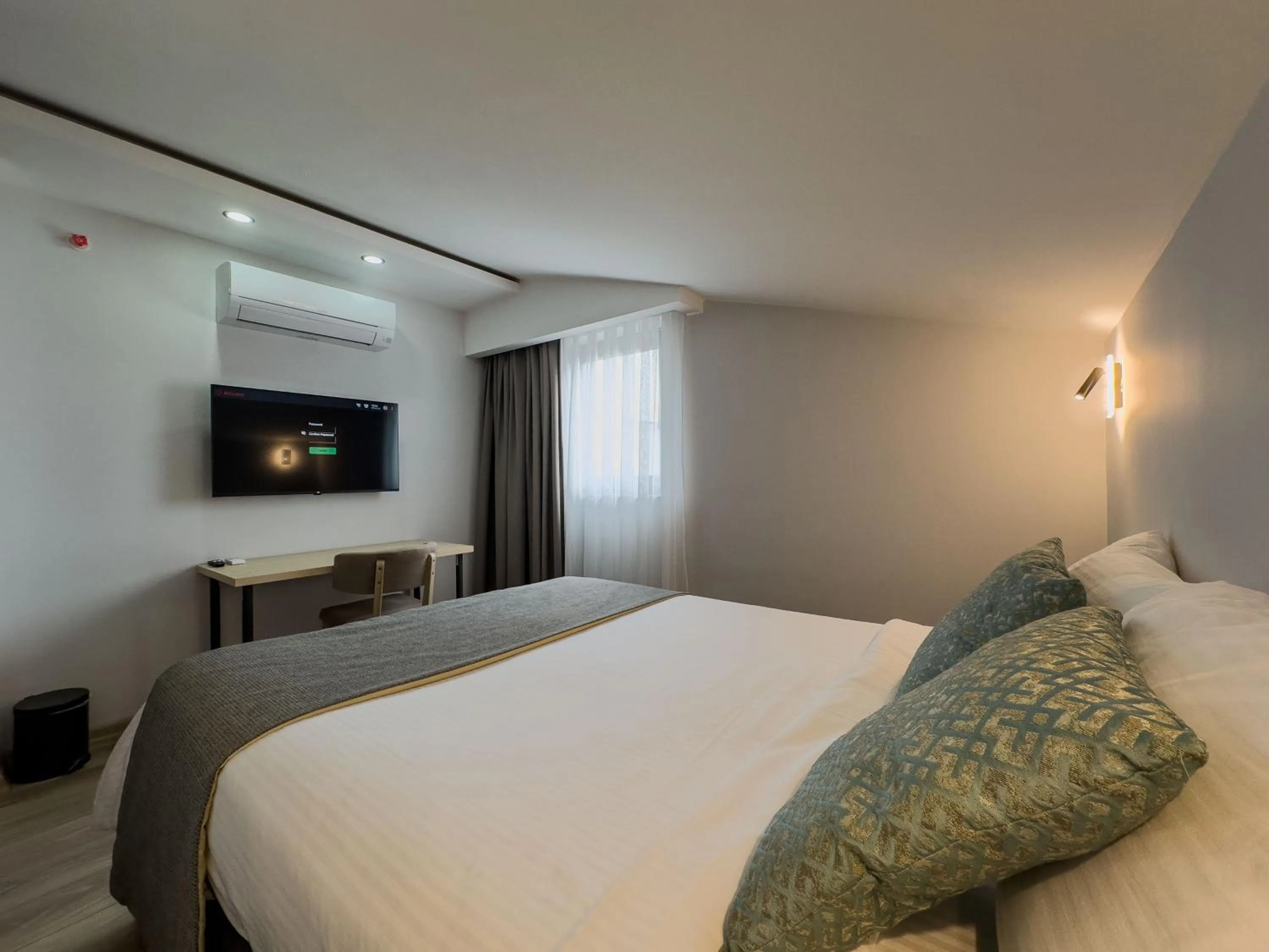 Bed in Leaf River Suites