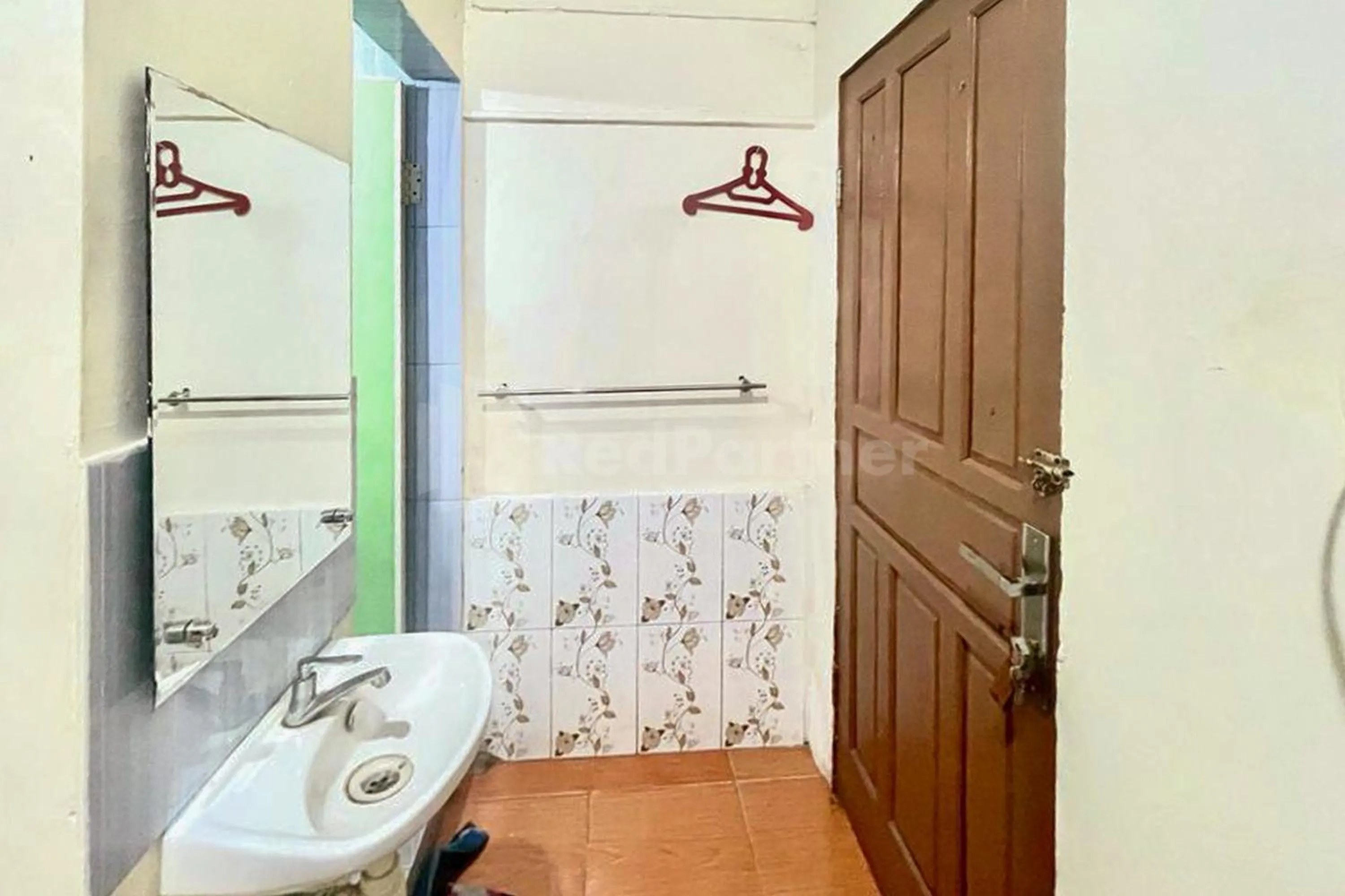 Bathroom in 889 Guesthouse RedPartner