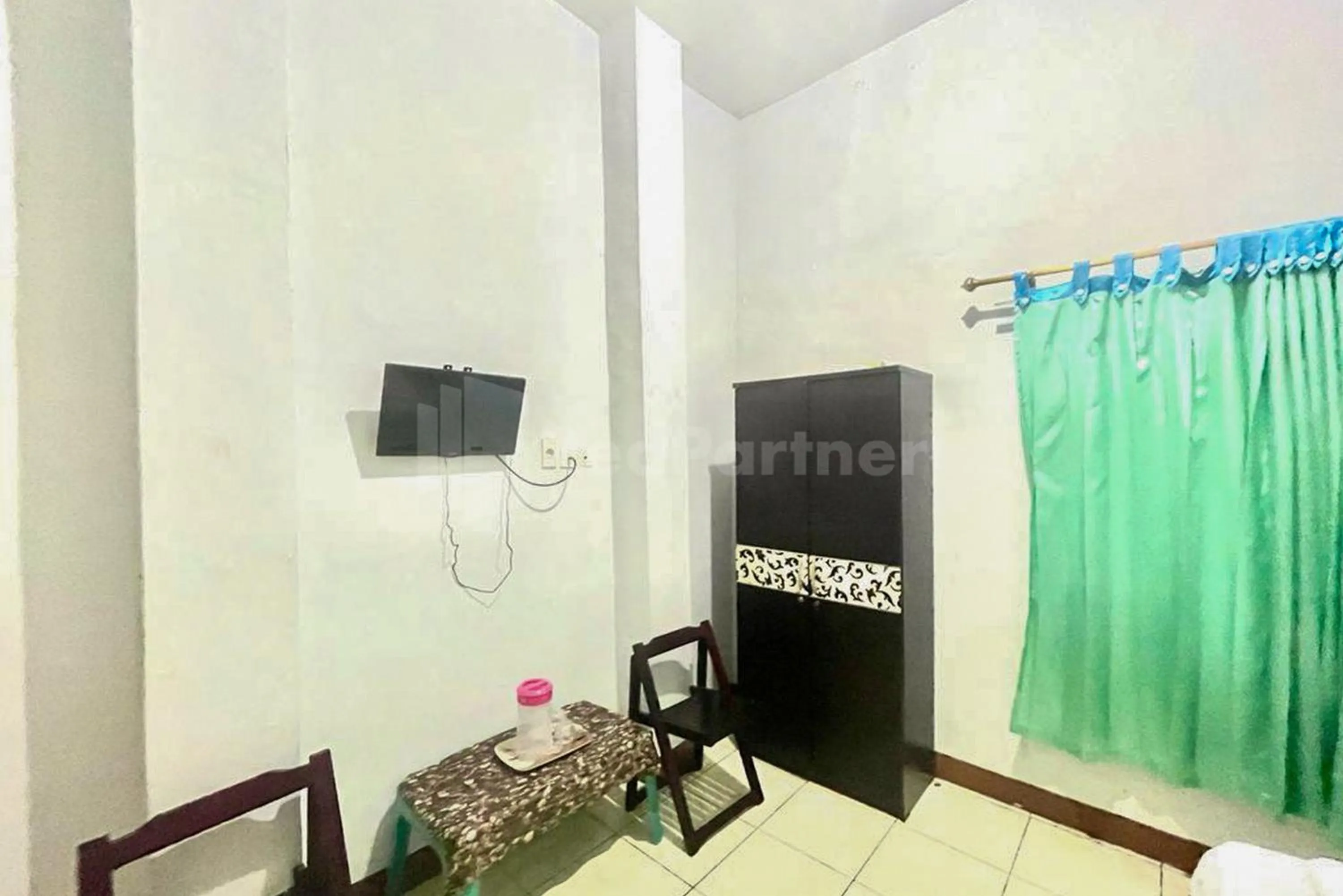 Bedroom in 889 Guesthouse RedPartner