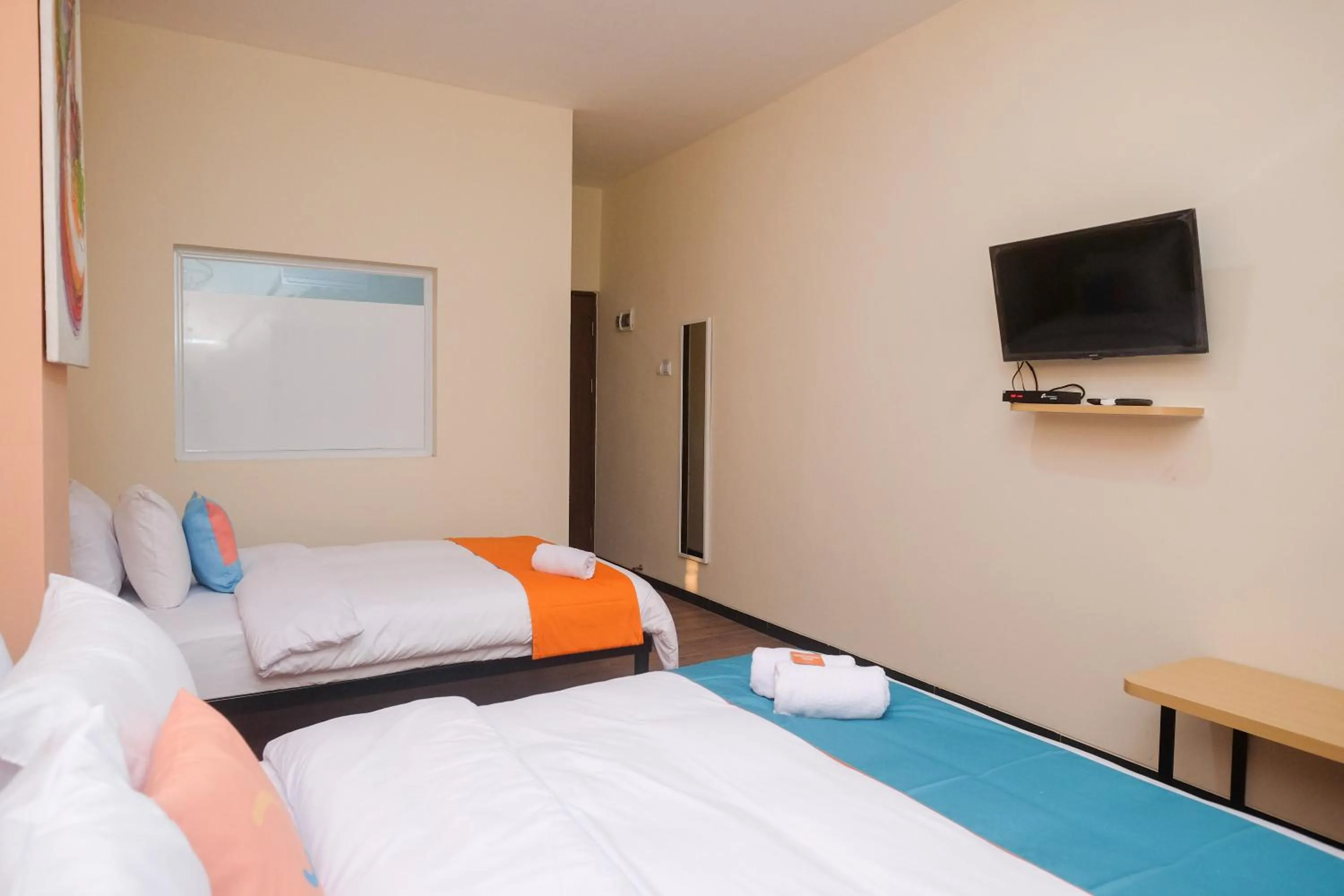 Bedroom, Bed in Sans Hotel City Park Medoho Semarang