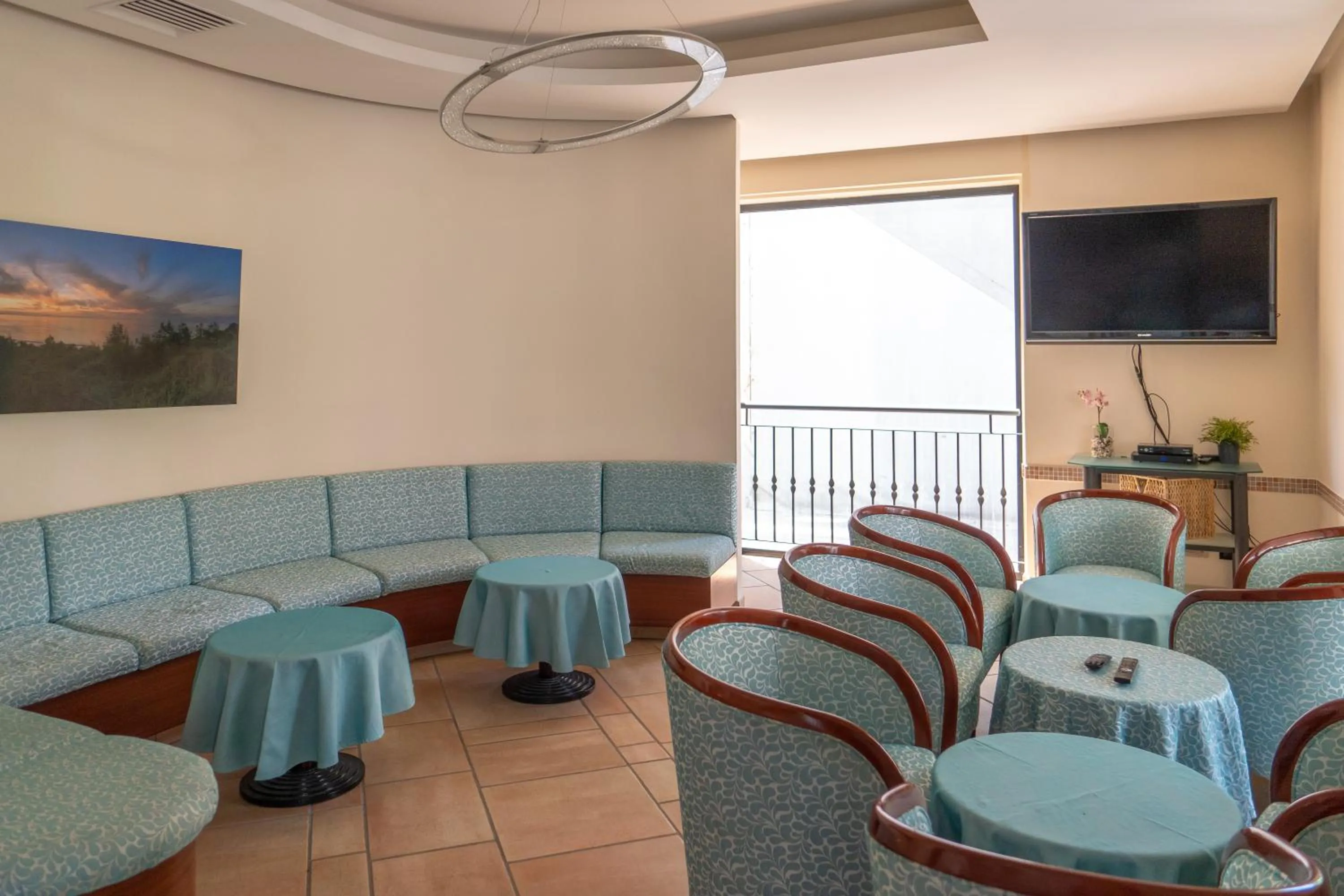 Communal lounge/ TV room in Hotel Tiglio