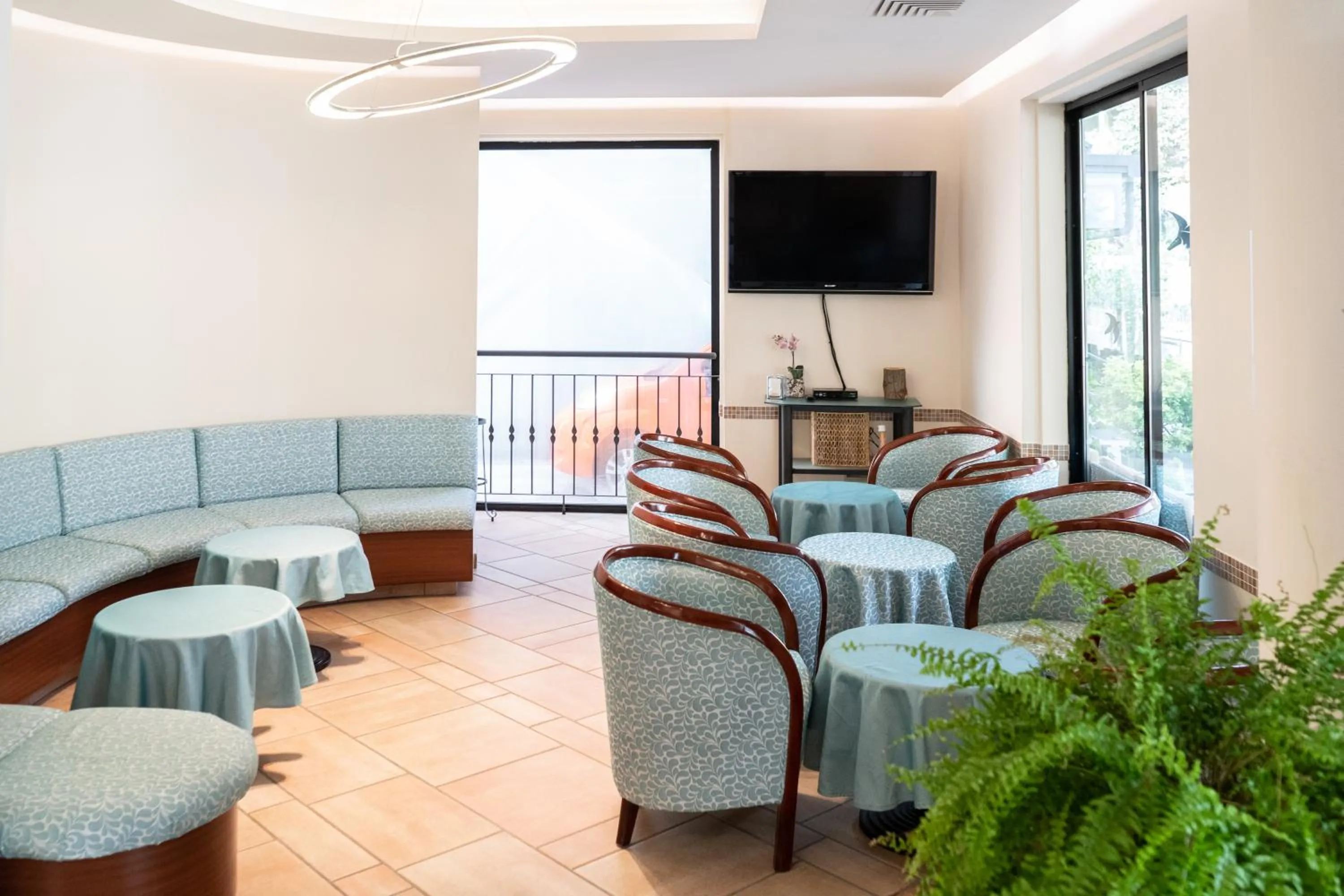 Communal lounge/ TV room in Hotel Tiglio