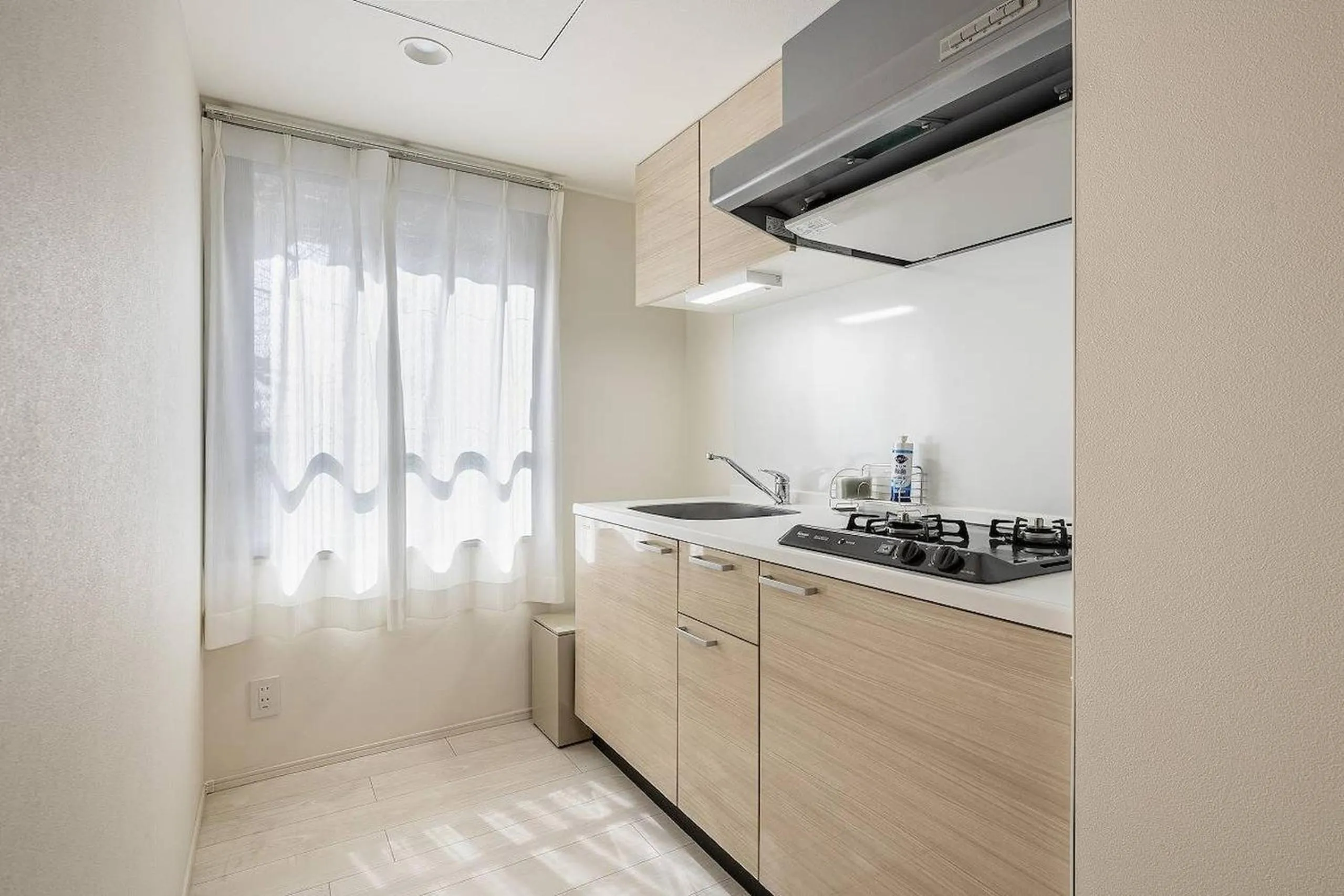 Kitchen or kitchenette in NOZOMIO PREMIER Meidaimae