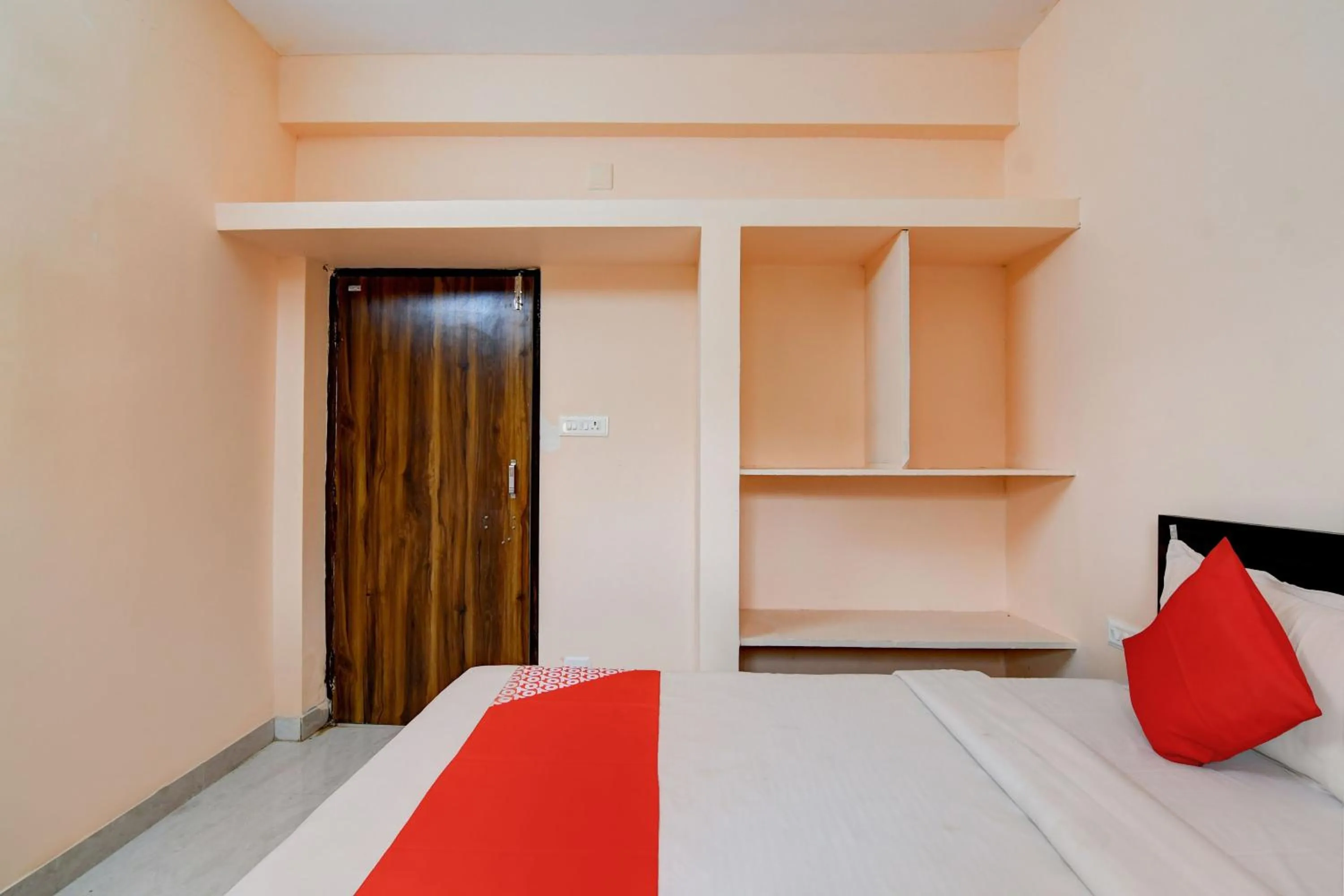 Bedroom in Hotel O Flagship S S Guesthouse