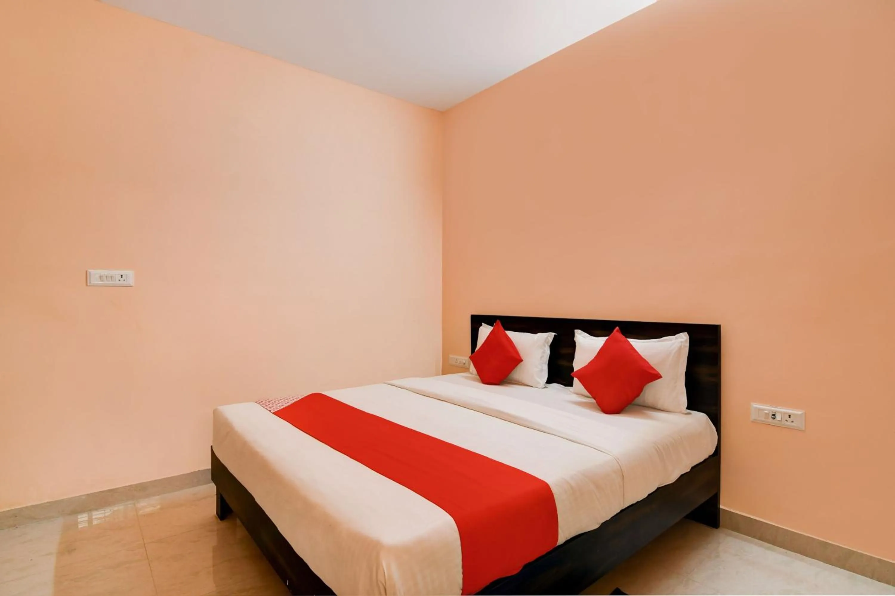 Bedroom in Hotel O Flagship S S Guesthouse