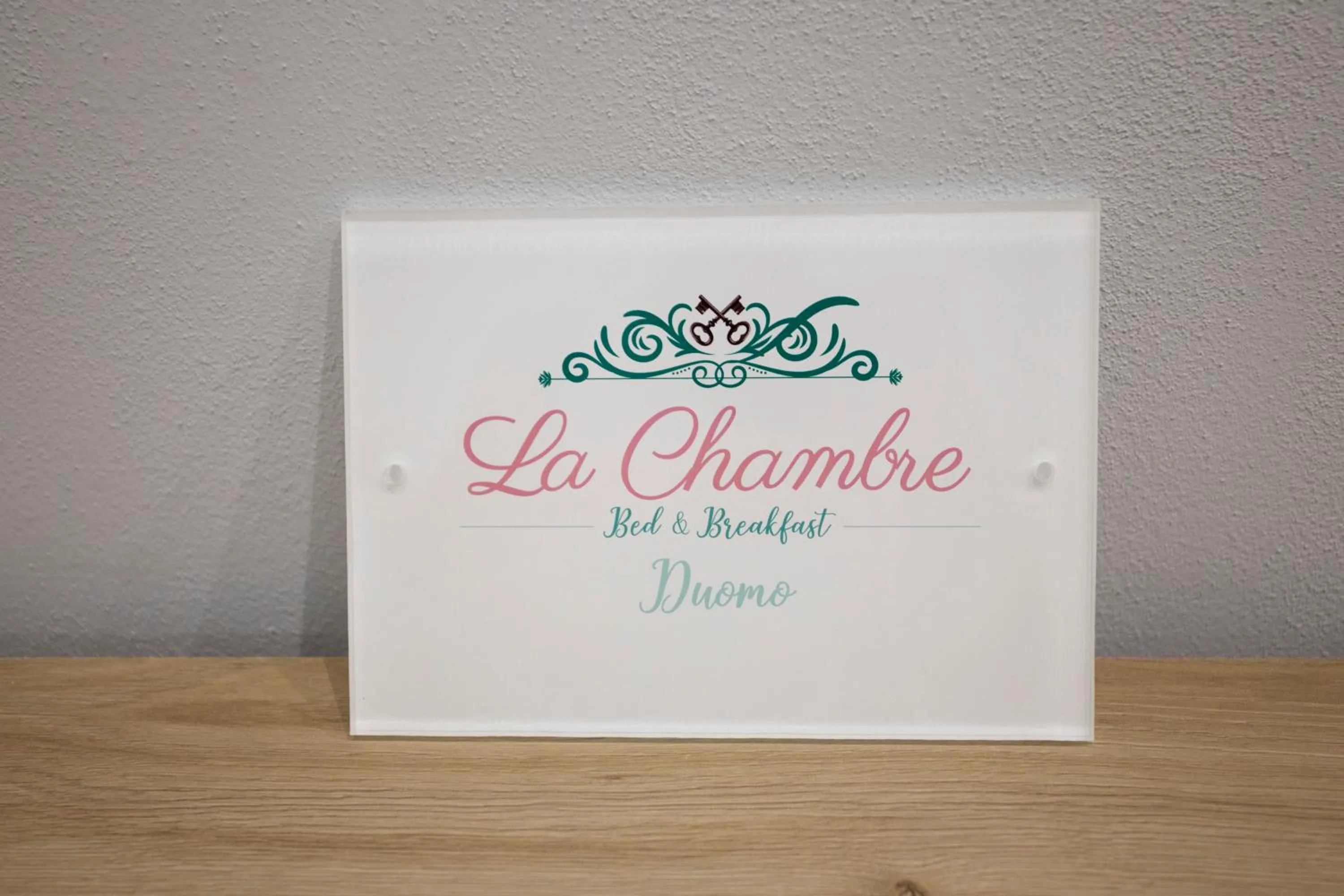 Property logo or sign in La Chambre Duomo