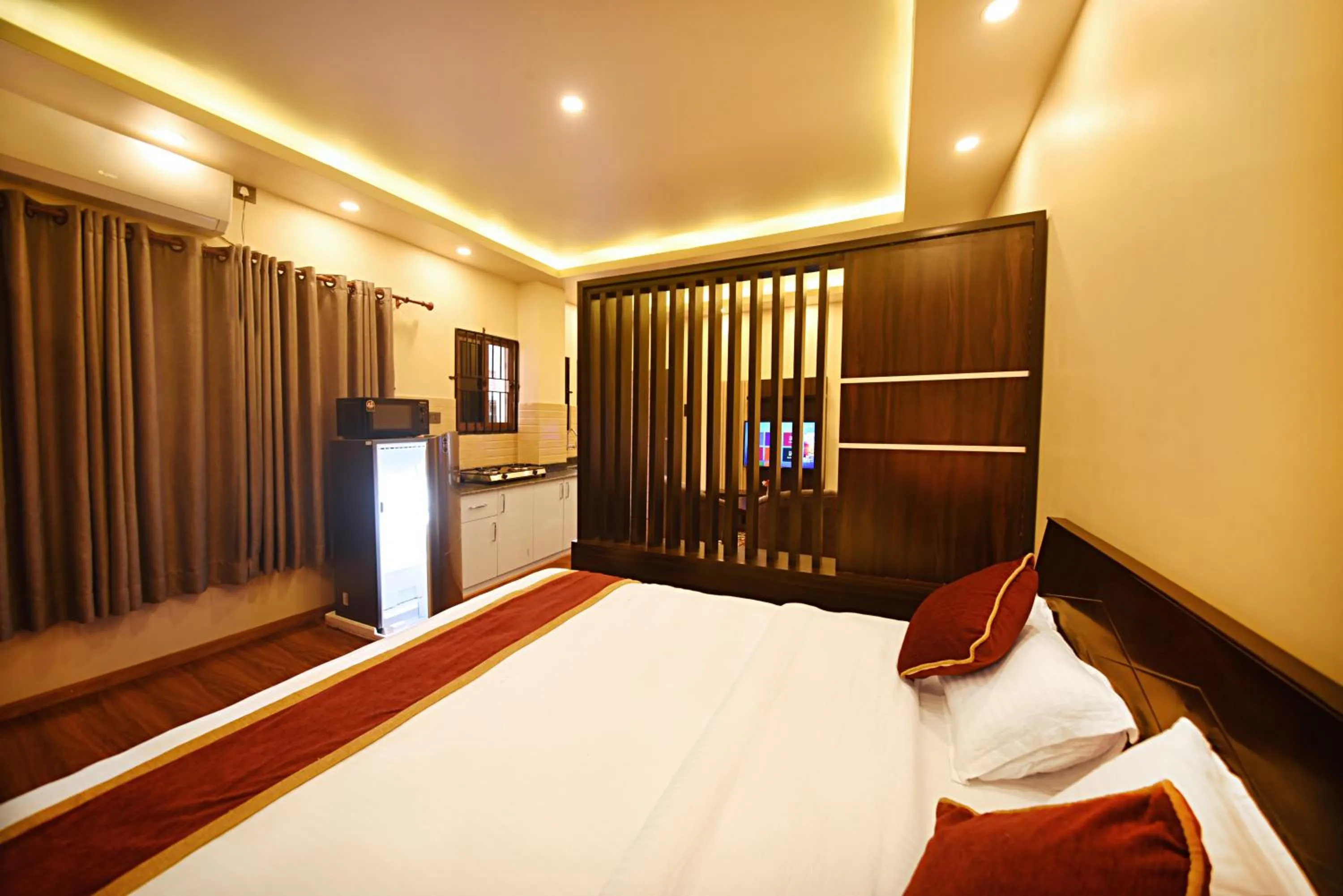 Communal lounge/ TV room, Bed in Friends Apartment Pvt.Ltd