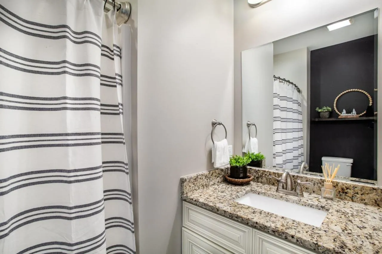 Bathroom in Elegant End Condo Fireplace Community Amenities