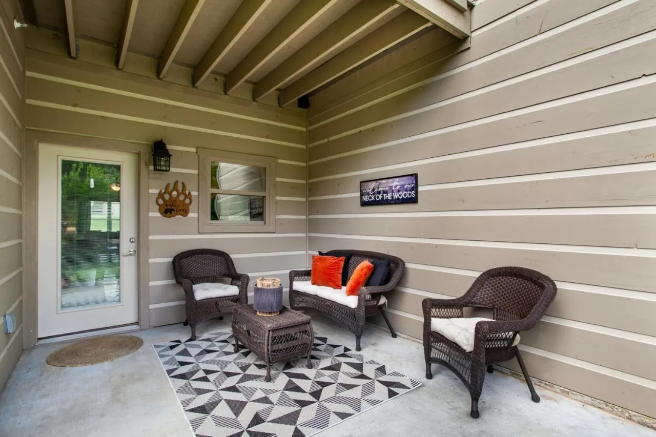 Patio in Elegant End Condo Fireplace Community Amenities
