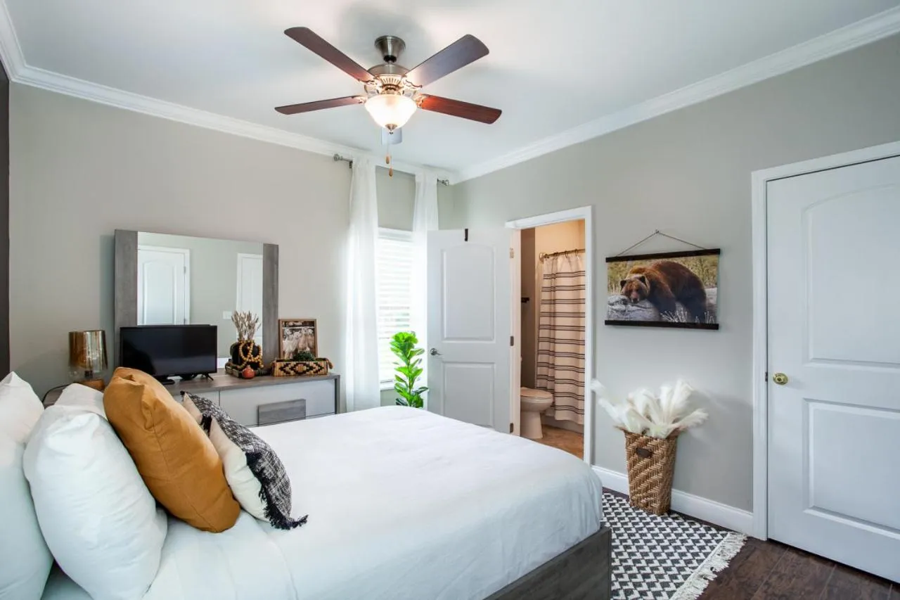 Bed in Elegant End Condo Fireplace Community Amenities