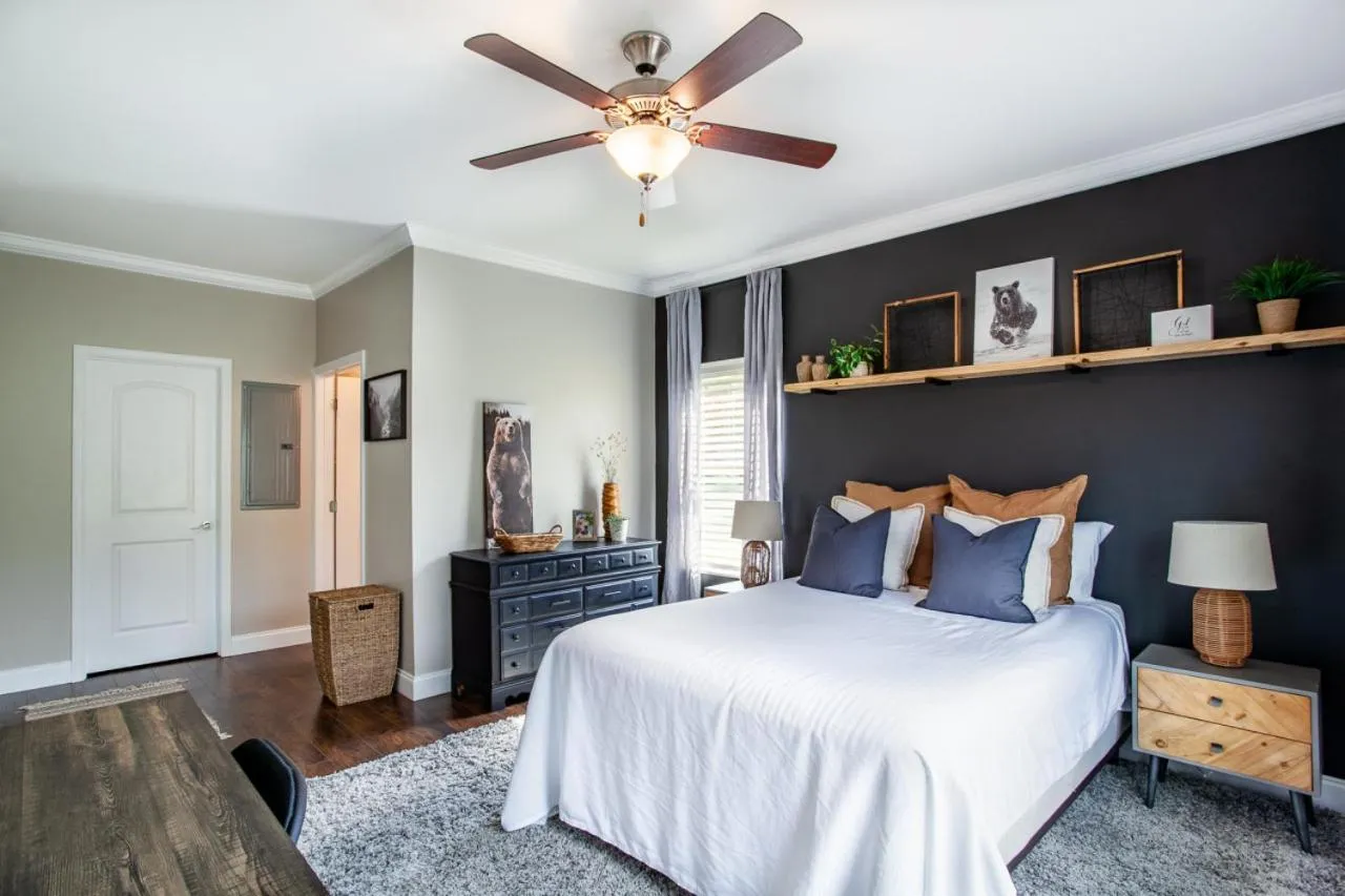 Bed in Elegant End Condo Fireplace Community Amenities