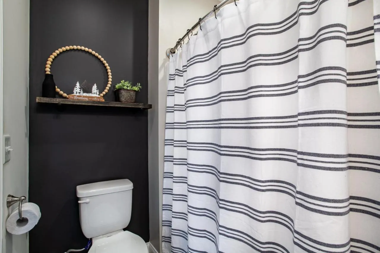 Bathroom in Elegant End Condo Fireplace Community Amenities