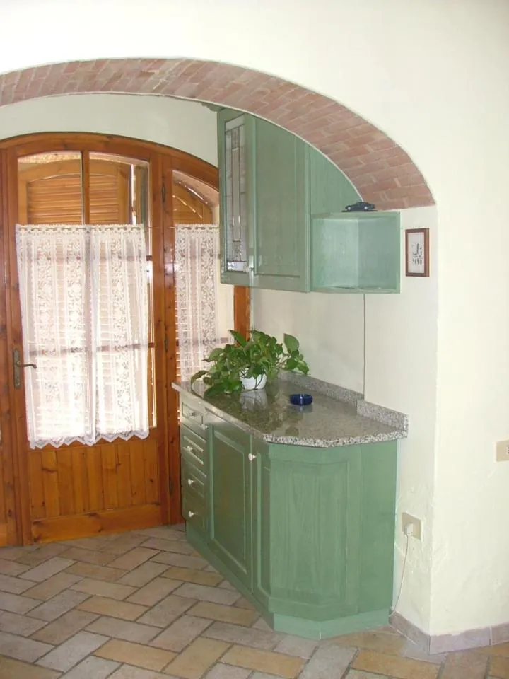 Kitchen or kitchenette in Casa Vacanza Le Case