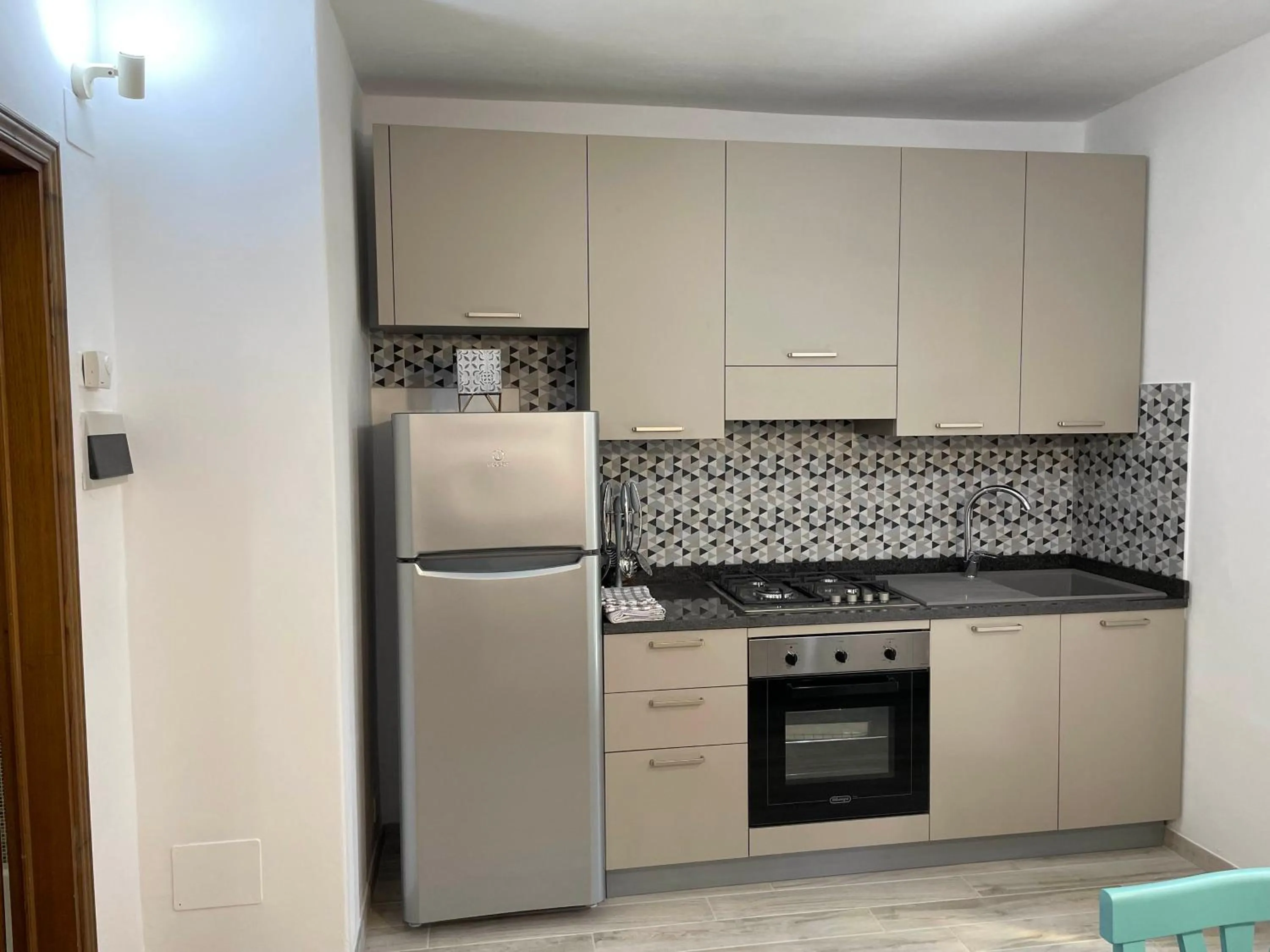 Kitchen or kitchenette in Casa Vacanza Le Case