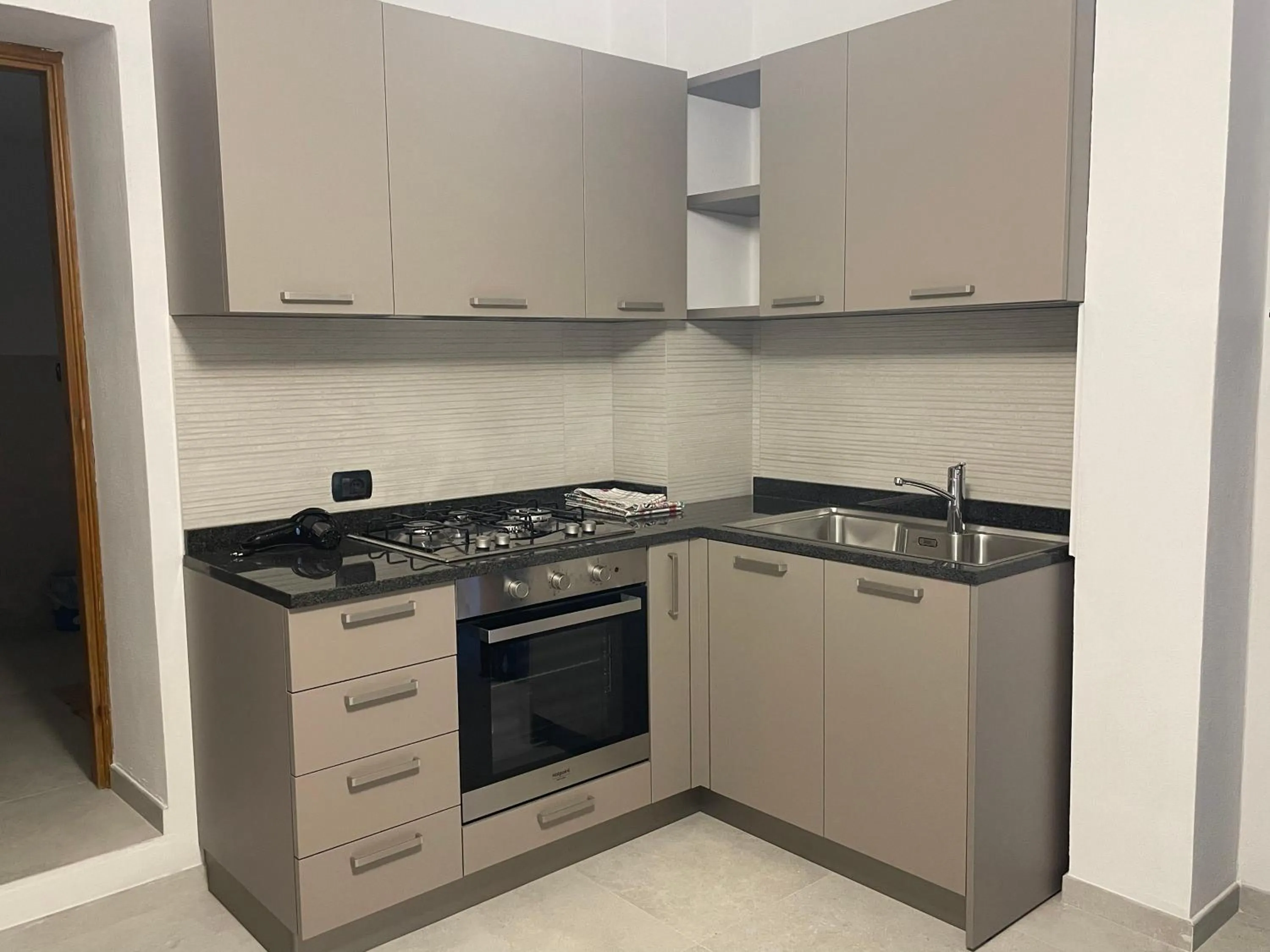 Kitchen or kitchenette in Casa Vacanza Le Case