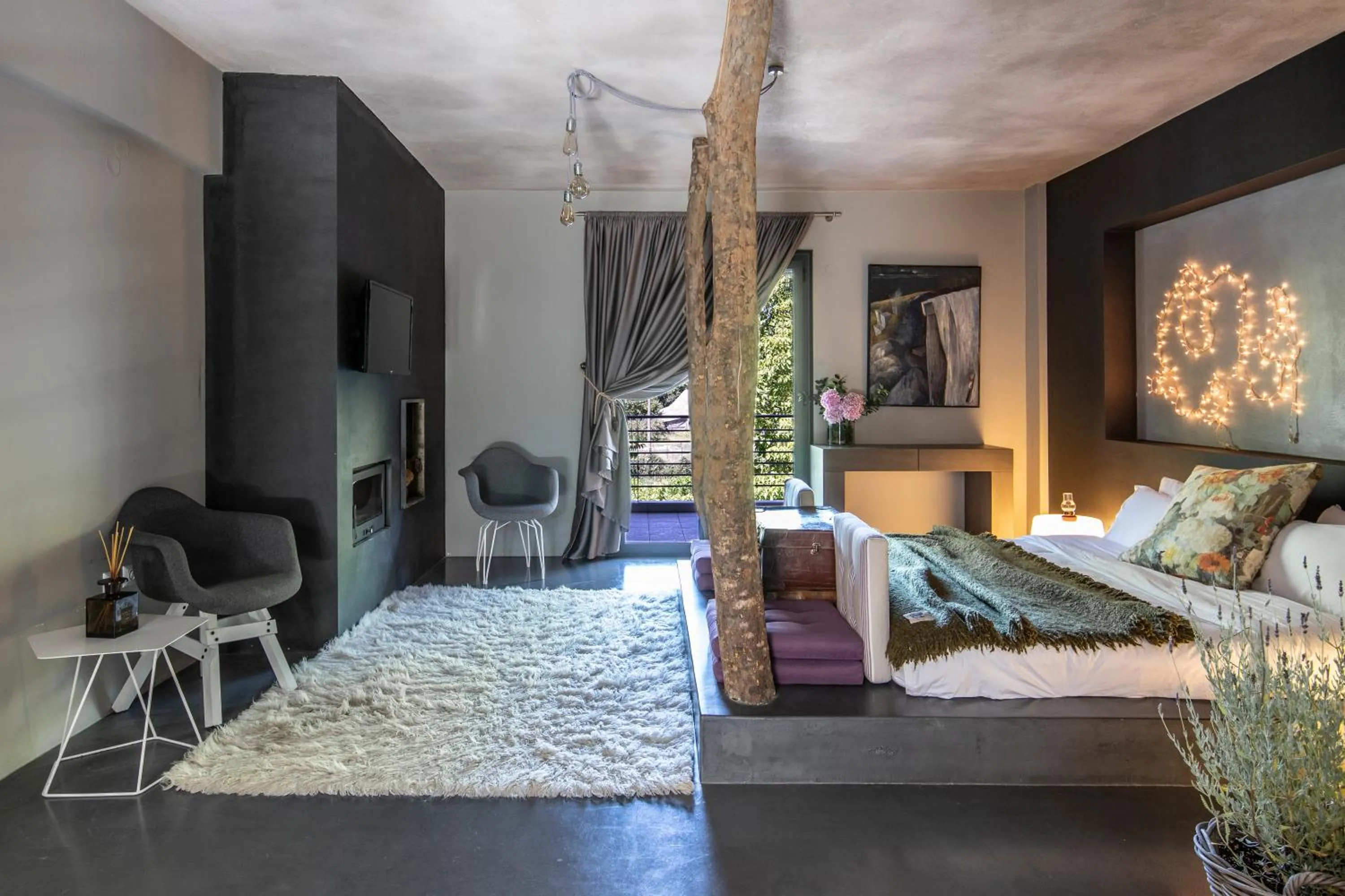 Bed in Oniropetra Boutique Hotel