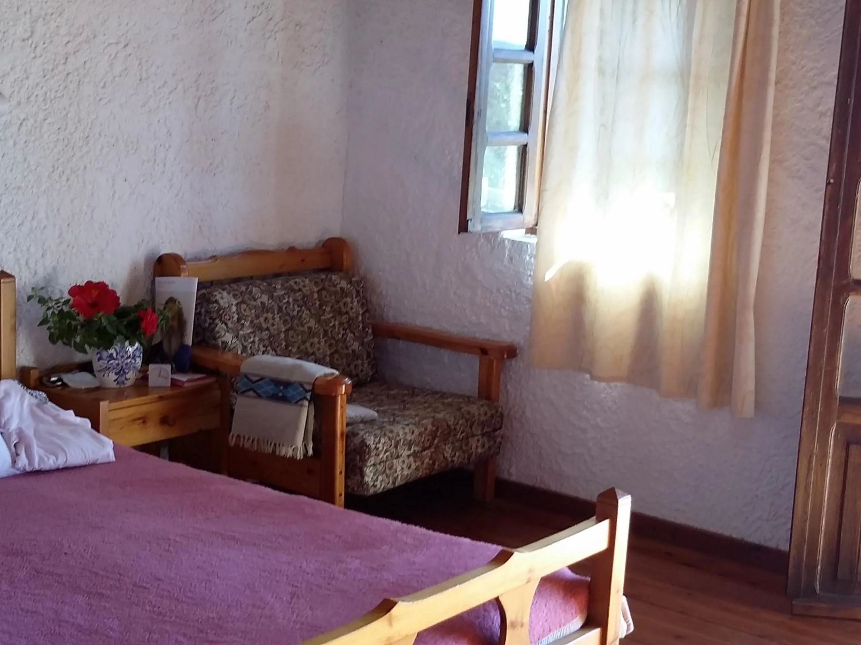 Bed in Olive tree Cottages