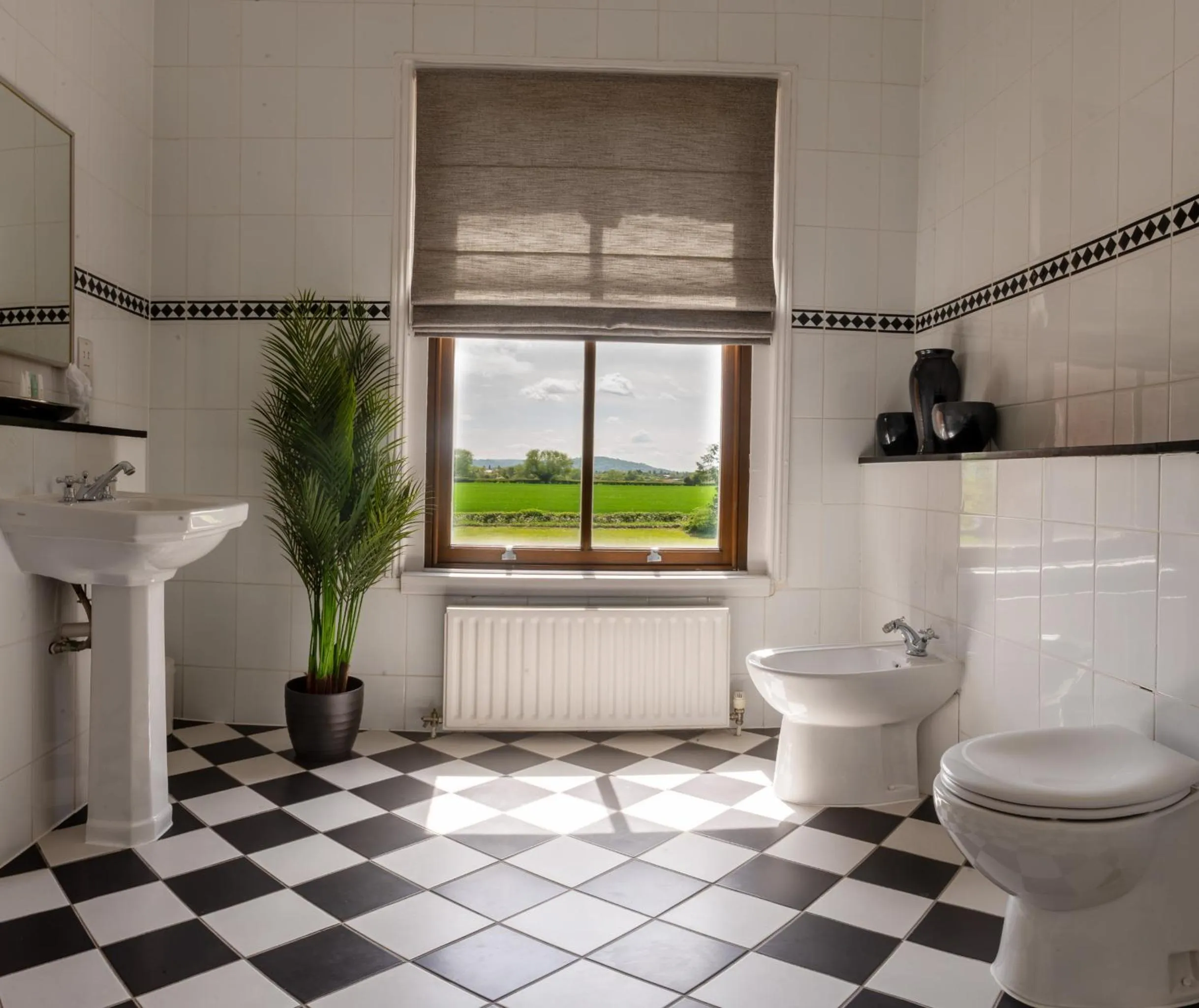 Bathroom in Hatherley Manor Hotel & Spa