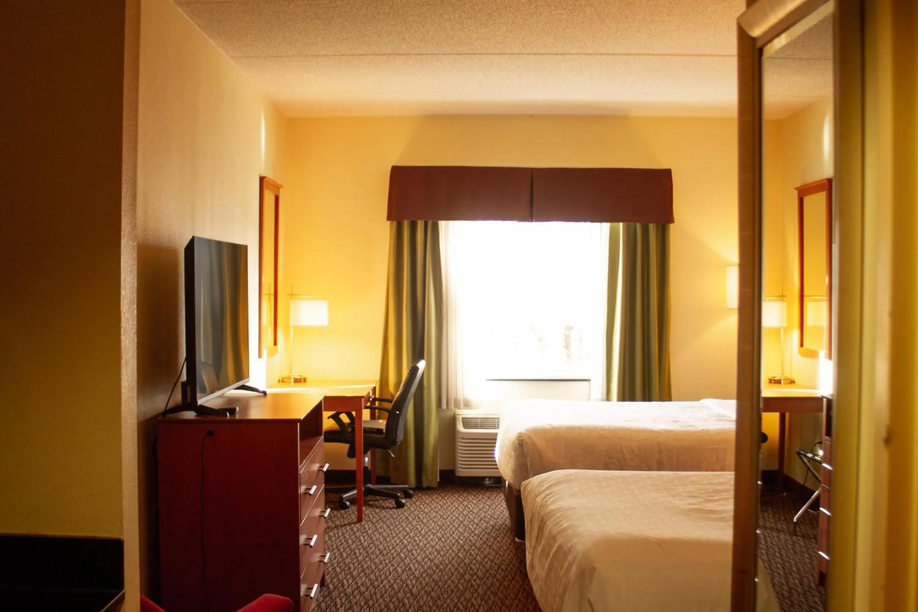 Bed in University Hotel & Suites Shippensburg, Trademark by Wyndham Bed in University Hotel & Suites Shippensburg, Trademark by Wyndham