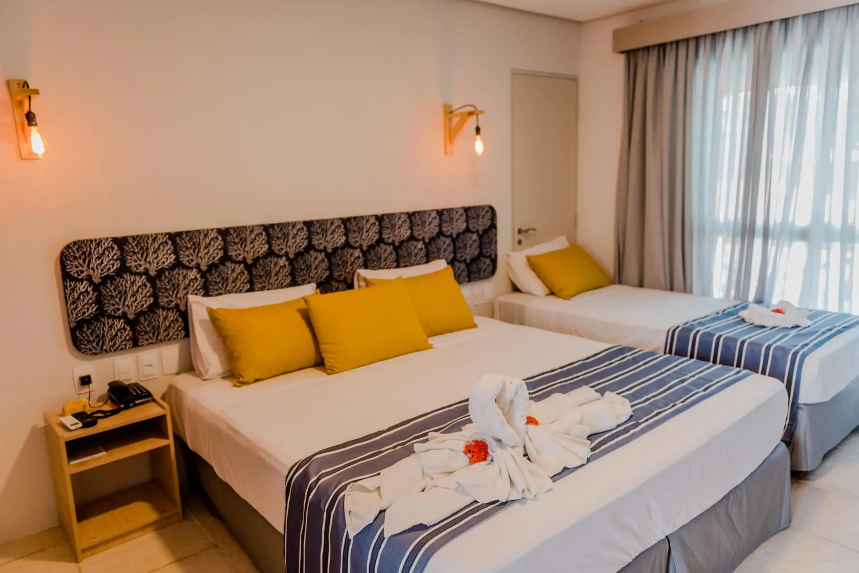 Deluxe Triple Room in Baía Branca Beach Resort Deluxe Triple Room in Baía Branca Beach Resort