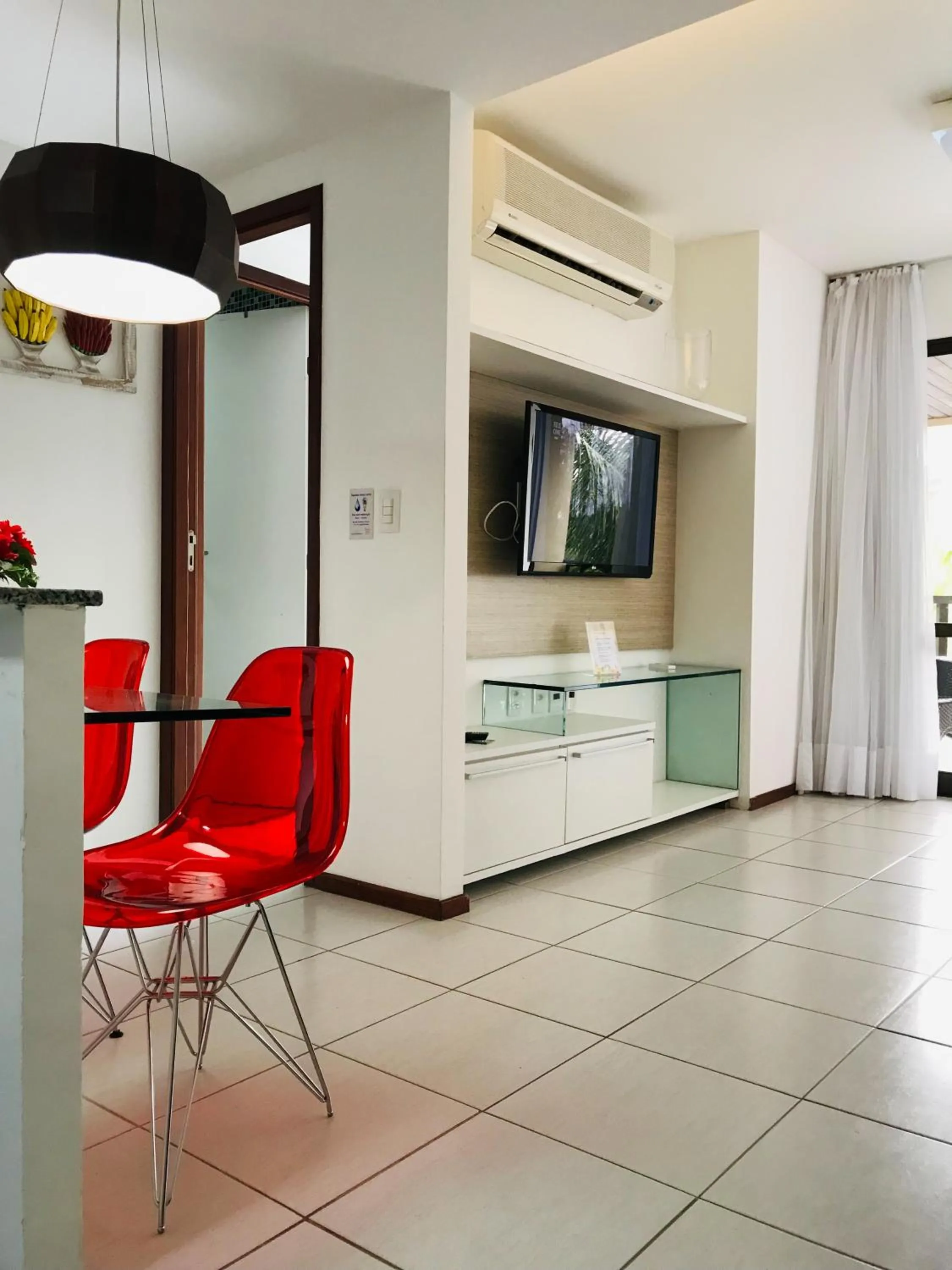 Living room in Nannai Residence by AFT