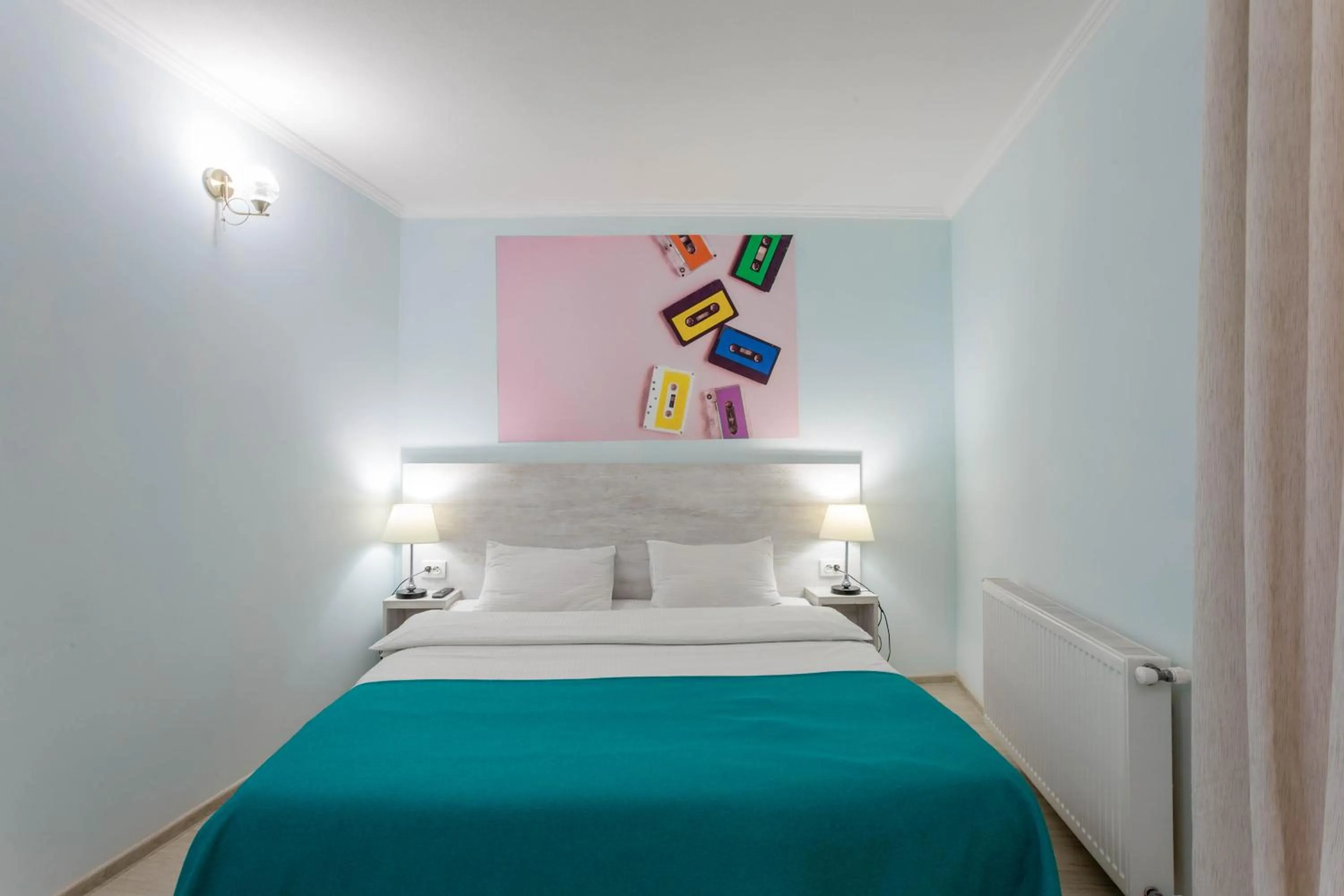 Bed in Hotel Tato & CoWorking space