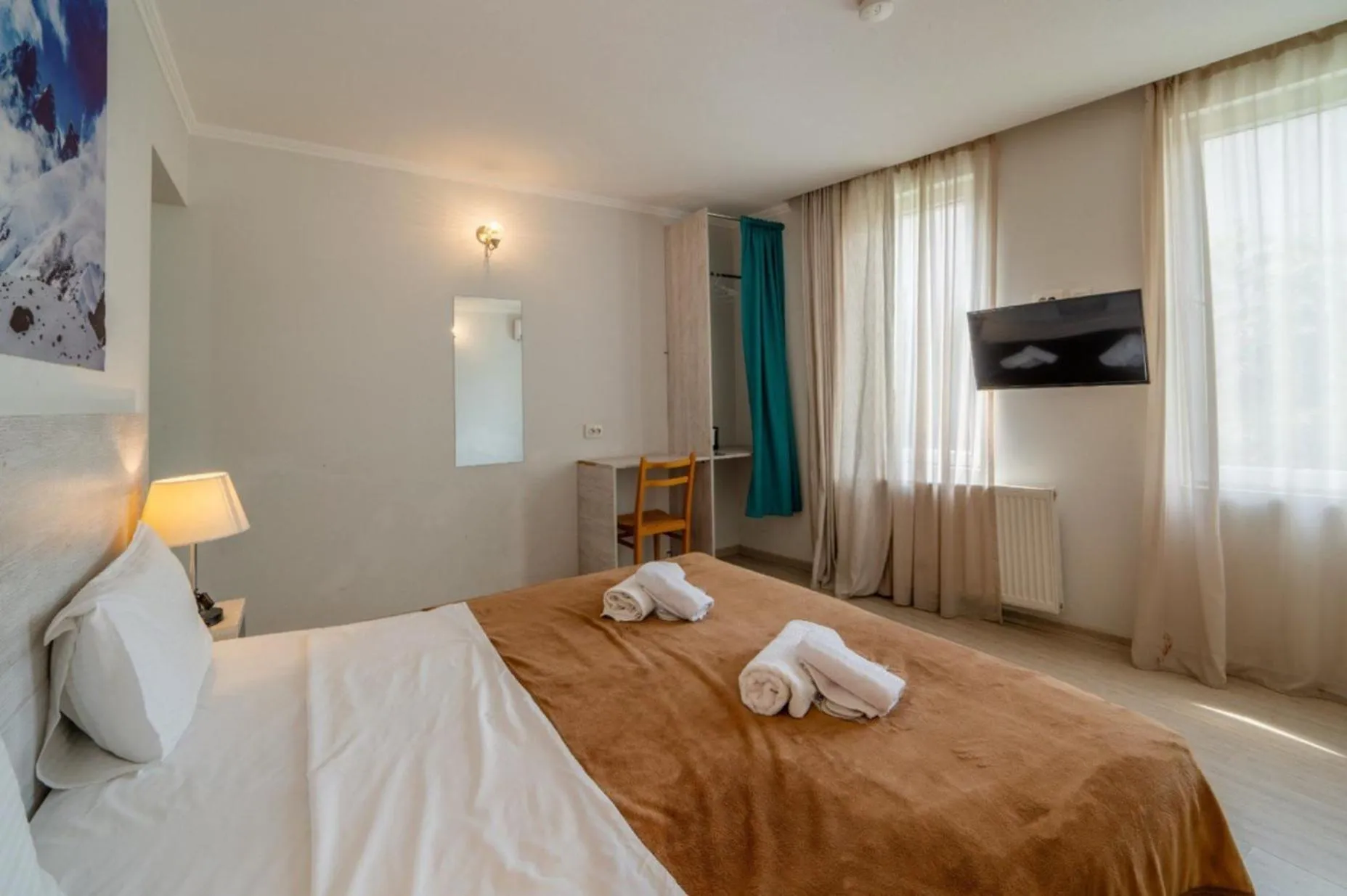 Bedroom, Bed in Hotel Tato & CoWorking space