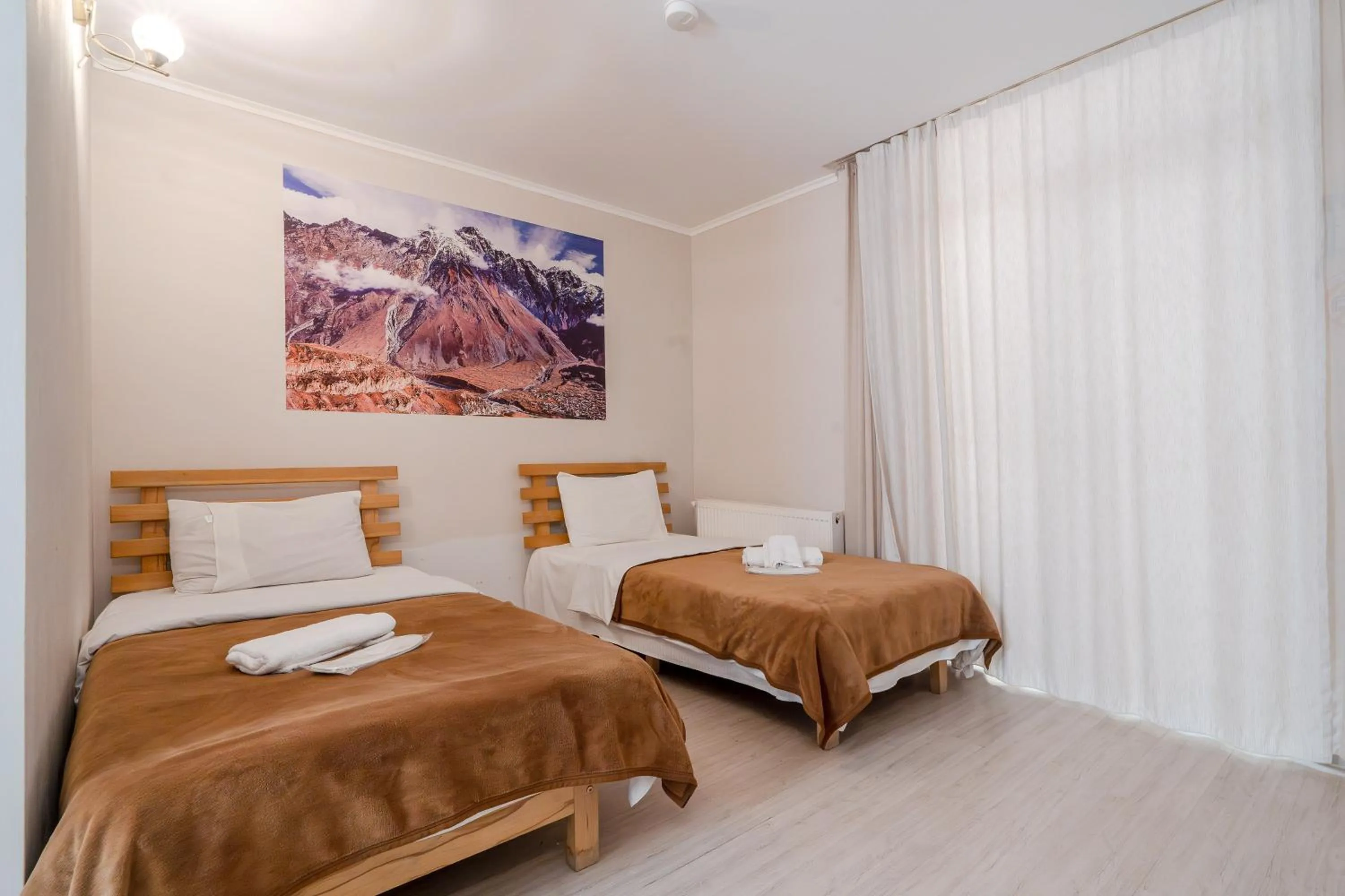 Bed in Hotel Tato & CoWorking space