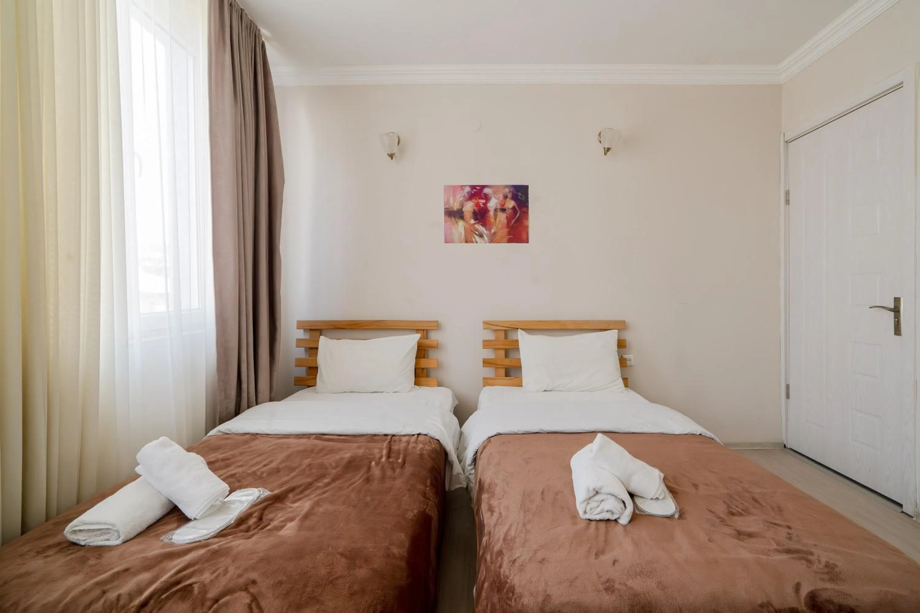 Bed in Hotel Tato & CoWorking space