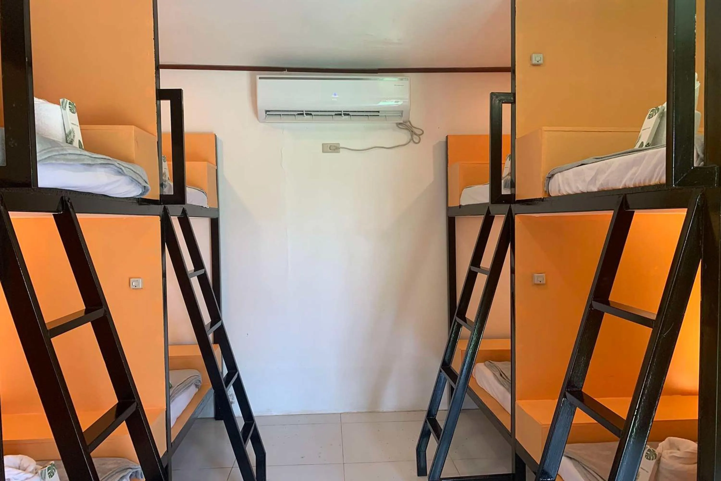 Photo of the whole room, Bed in Green Dale's Travellers Inn Puerto Princesa