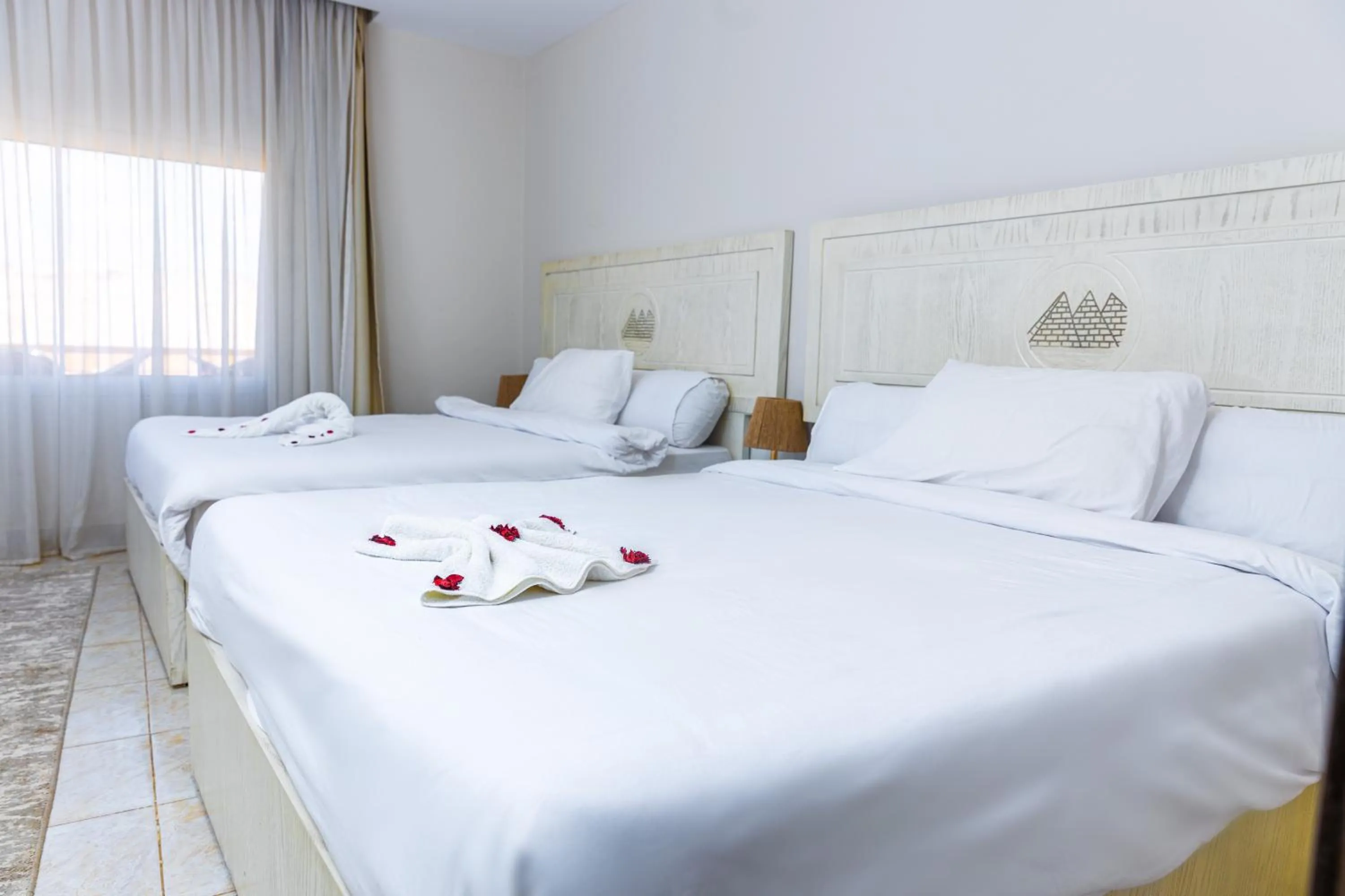 Bed in Pyramids Land Hotel