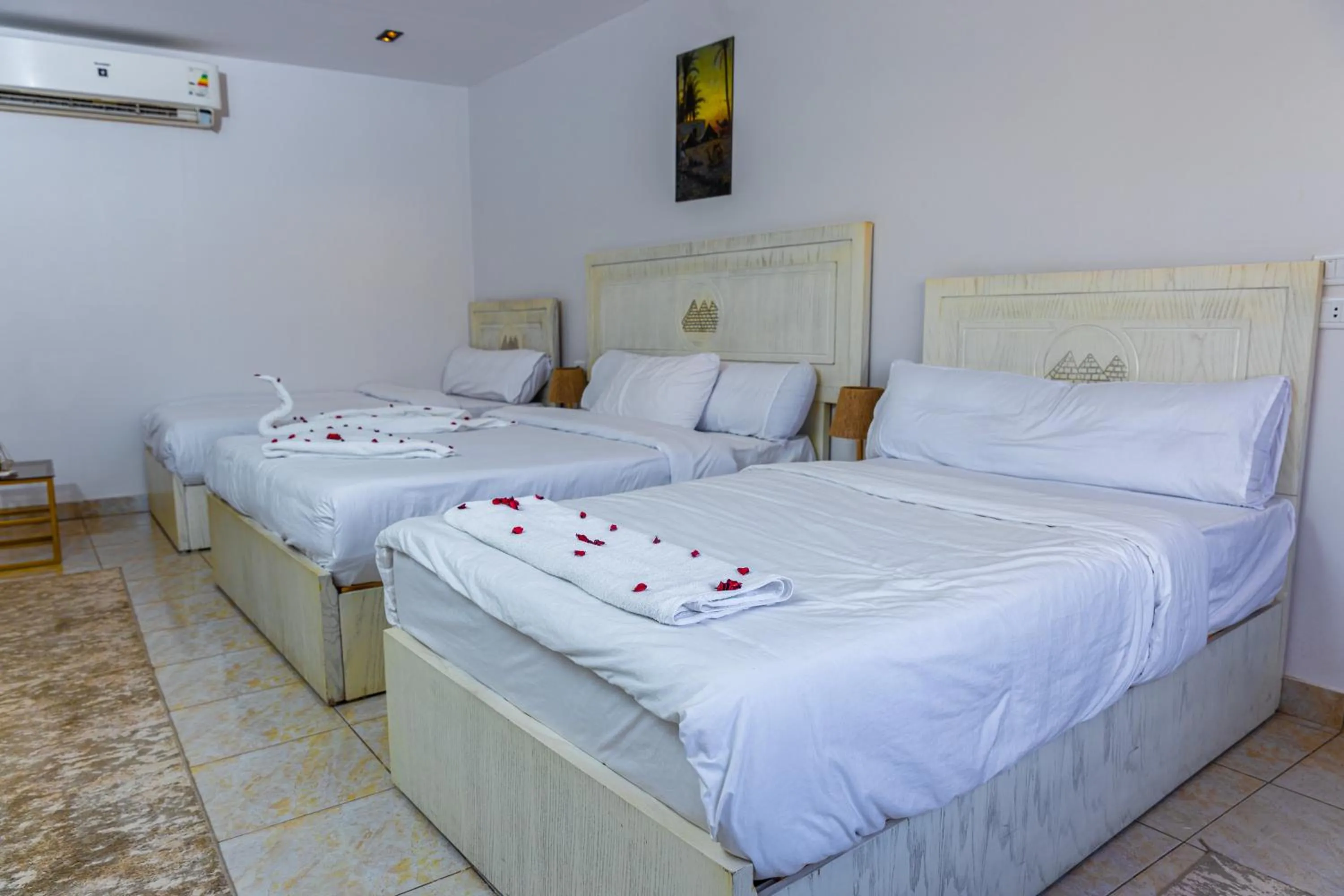 Bed in Pyramids Land Hotel