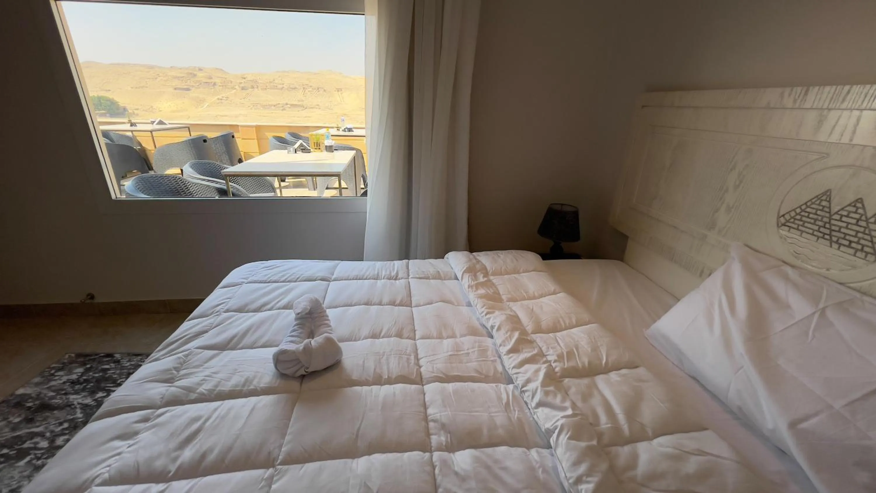 Bed in Pyramids Land Hotel
